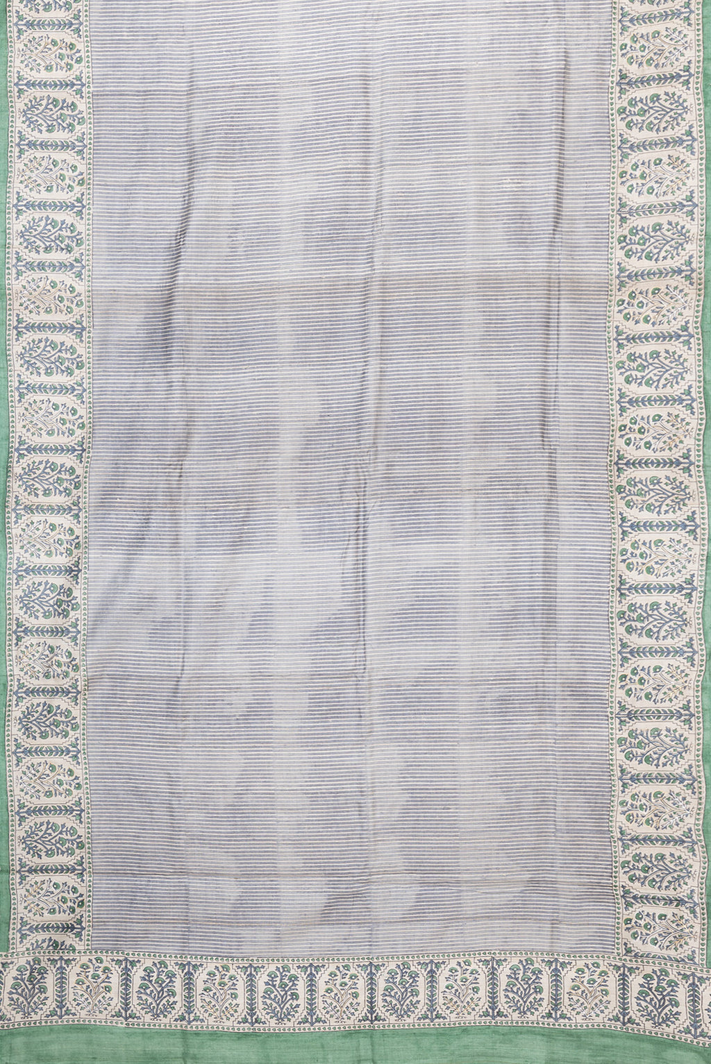 Flat view of Grey Dual Tone Tussar Silk Saree with Stripes on the body and Embroidery Border. 