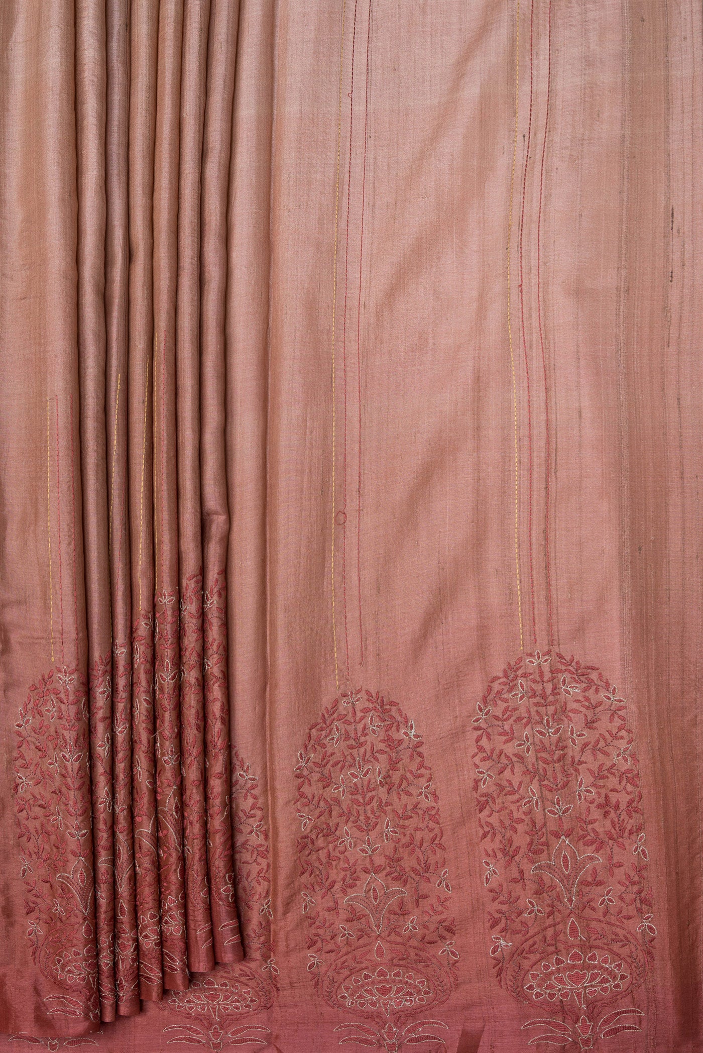 Pleats and pallu of Rose Gold Dual Tone Tussar Silk Saree with Embroidery on the body and Fancy Border. 