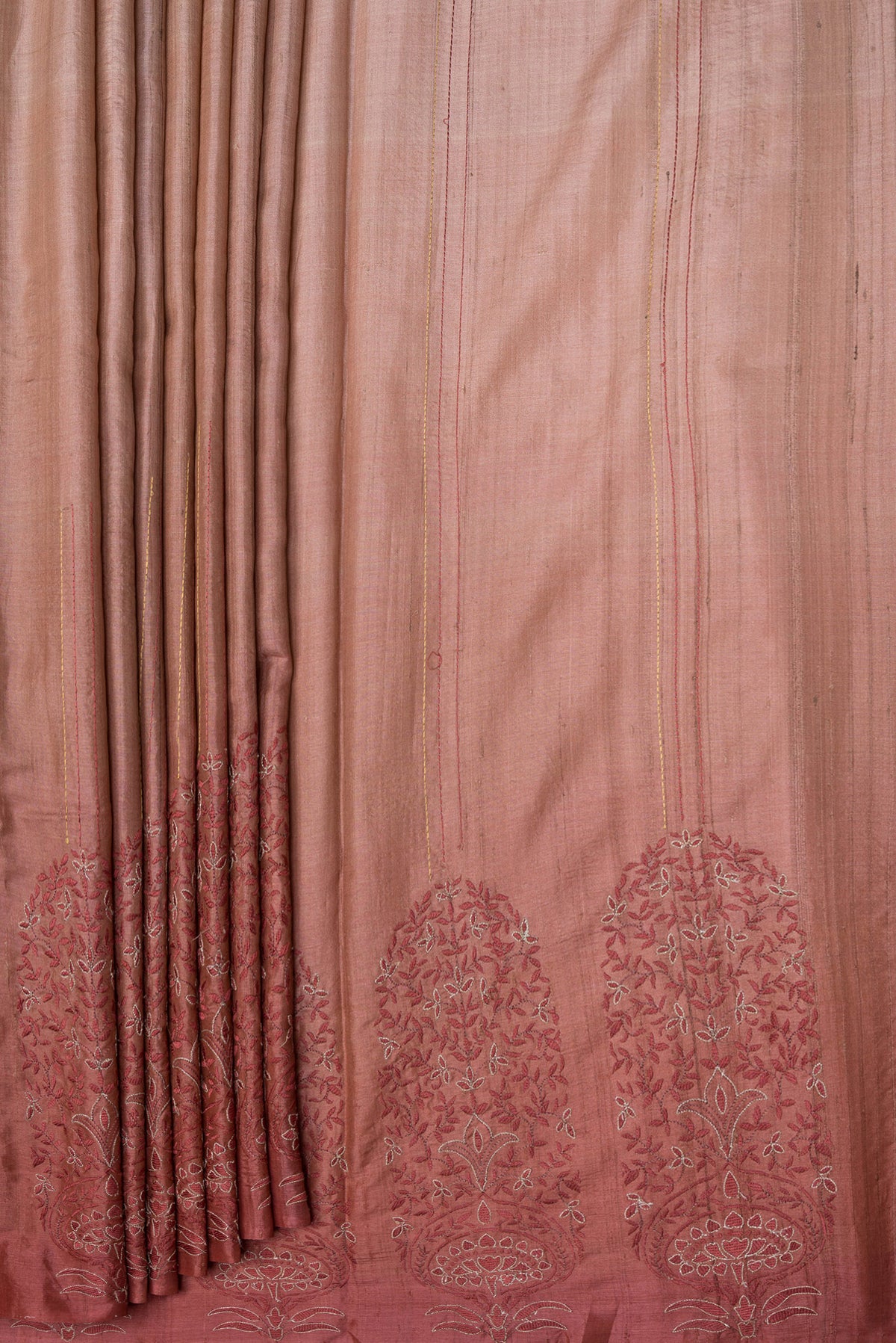 Pleats and pallu of Rose Gold Dual Tone Tussar Silk Saree with Embroidery on the body and Fancy Border. 