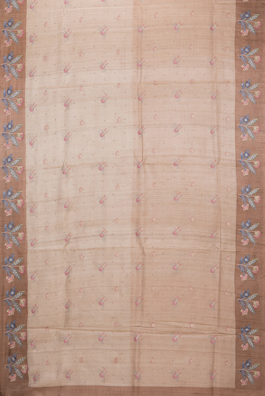 Flat view of Beige Tussar Silk Saree with Embroidery on the body and Embroidery Border. 