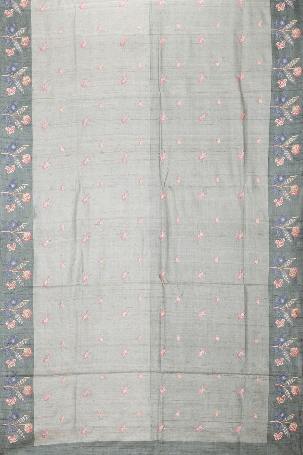 Flat view of Grey Dual Tone Tussar Silk Saree with Thread Butta on the body and Embroidery Border. 