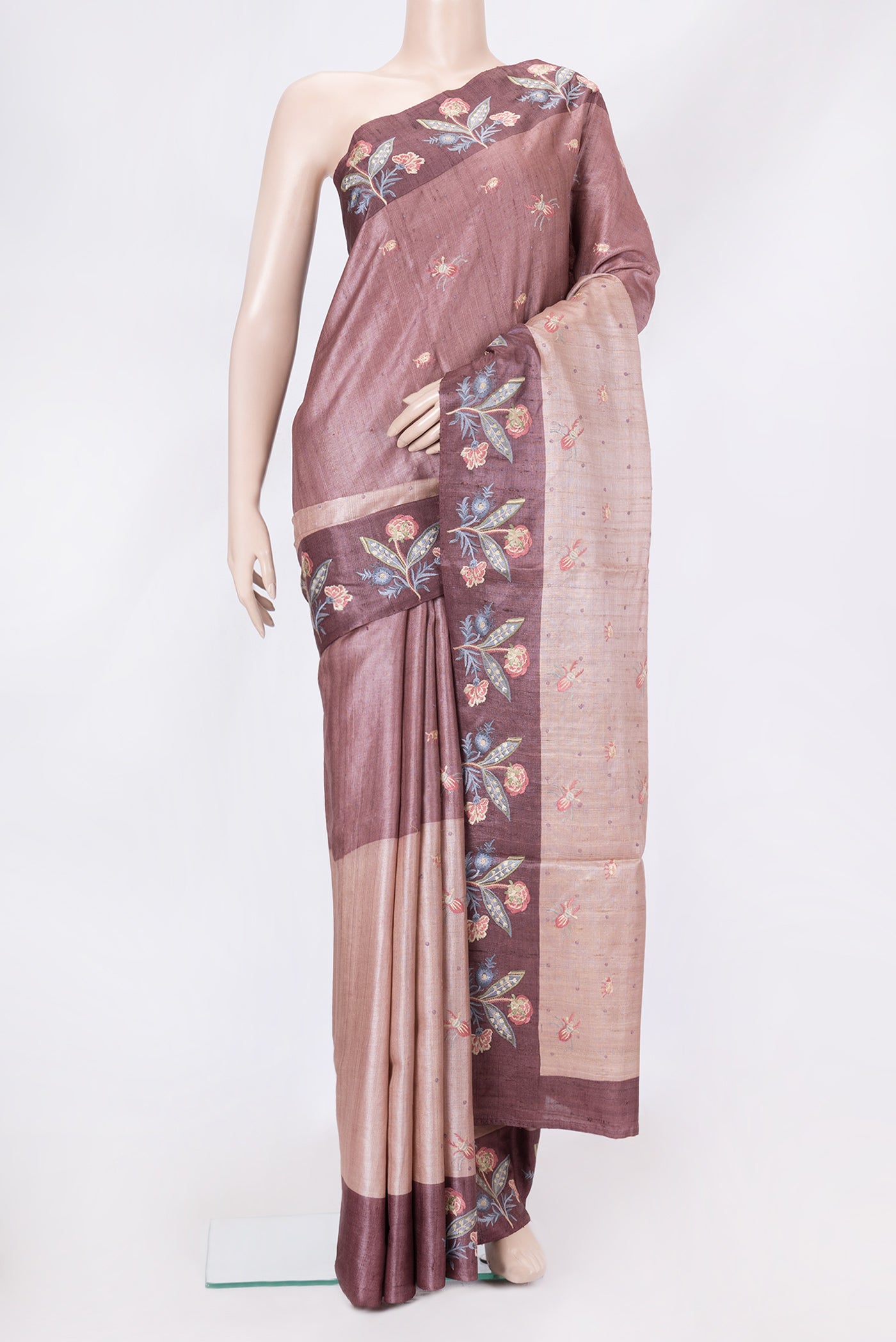Pink Dual Tone Tussar Silk Saree with Thread Butta on the body and Embroidery Border.  displayed on a mannequin