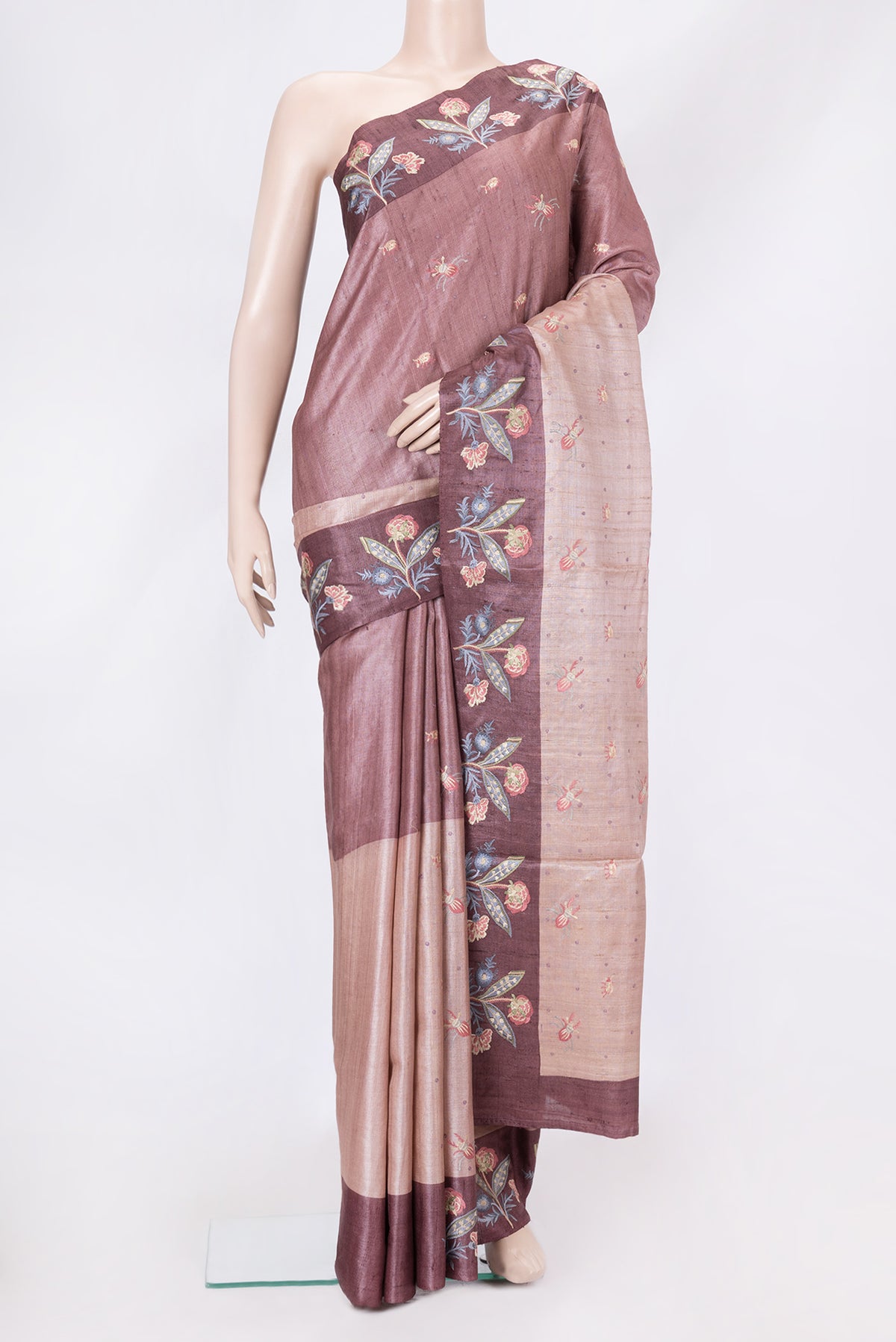 Pink Dual Tone Tussar Silk Saree with Thread Butta on the body and Embroidery Border.  displayed on a mannequin
