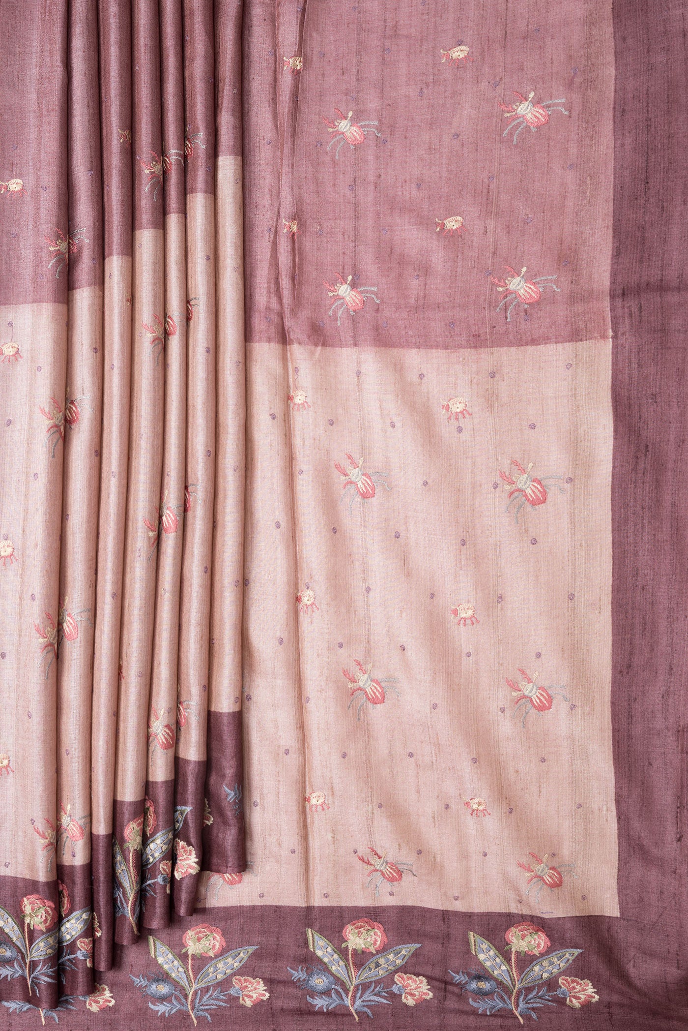 Pleats and pallu of Pink Dual Tone Tussar Silk Saree with Thread Butta on the body and Embroidery Border. 