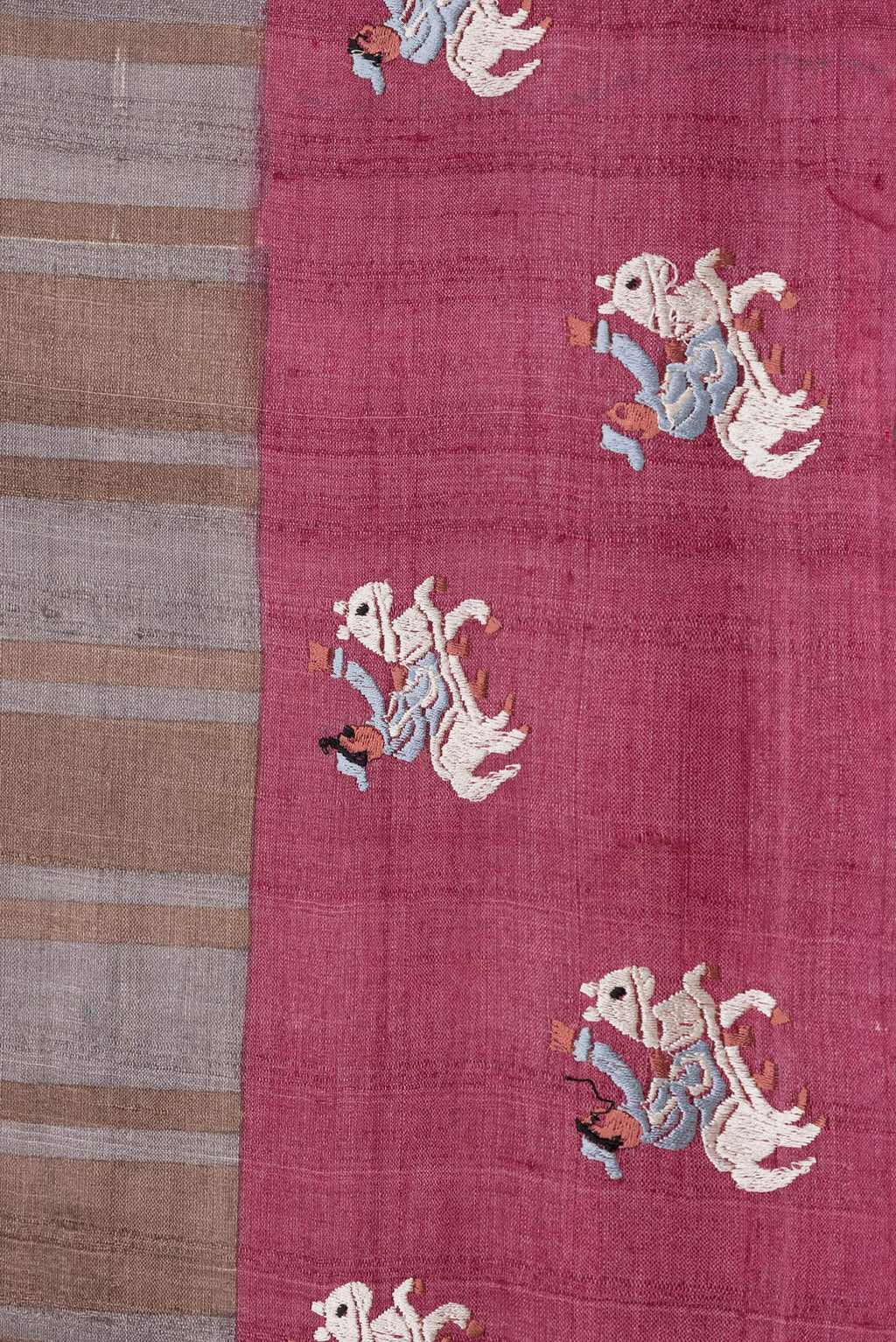 Border image of Grey Dual Tone Tussar Silk Saree with Stripes on the body and Embroidery Border. 