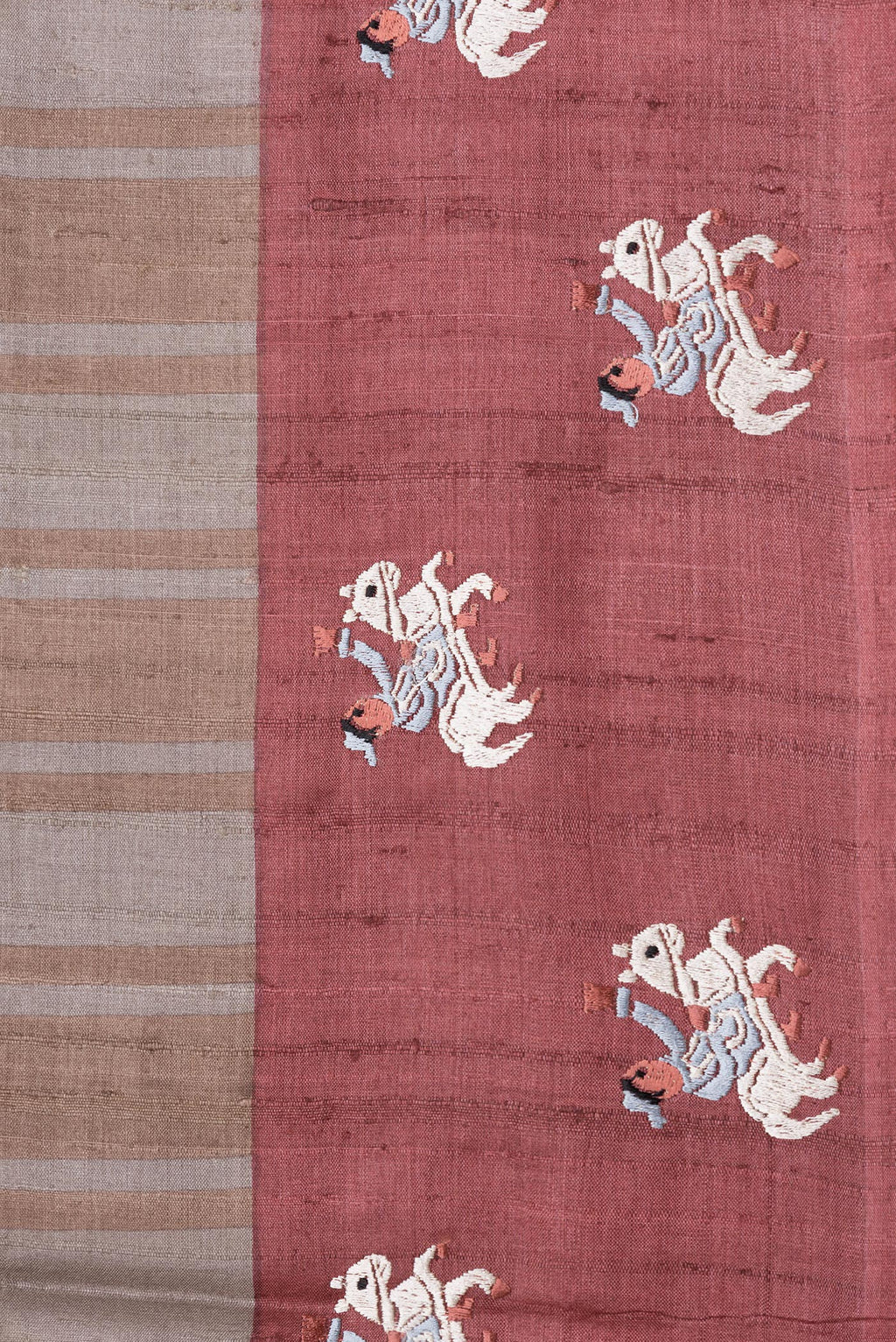 Border image of Grey Dual Tone Tussar Silk Saree with Stripes on the body and Embroidery Border. 