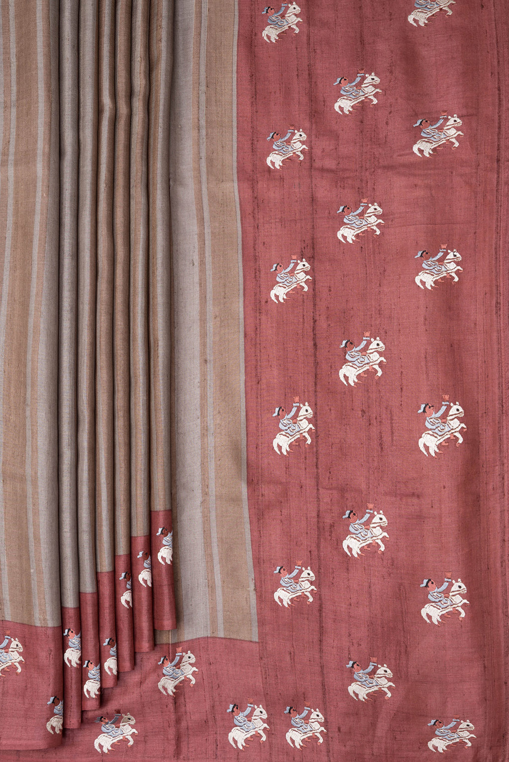 Pleats and pallu of Grey Dual Tone Tussar Silk Saree with Stripes on the body and Embroidery Border. 