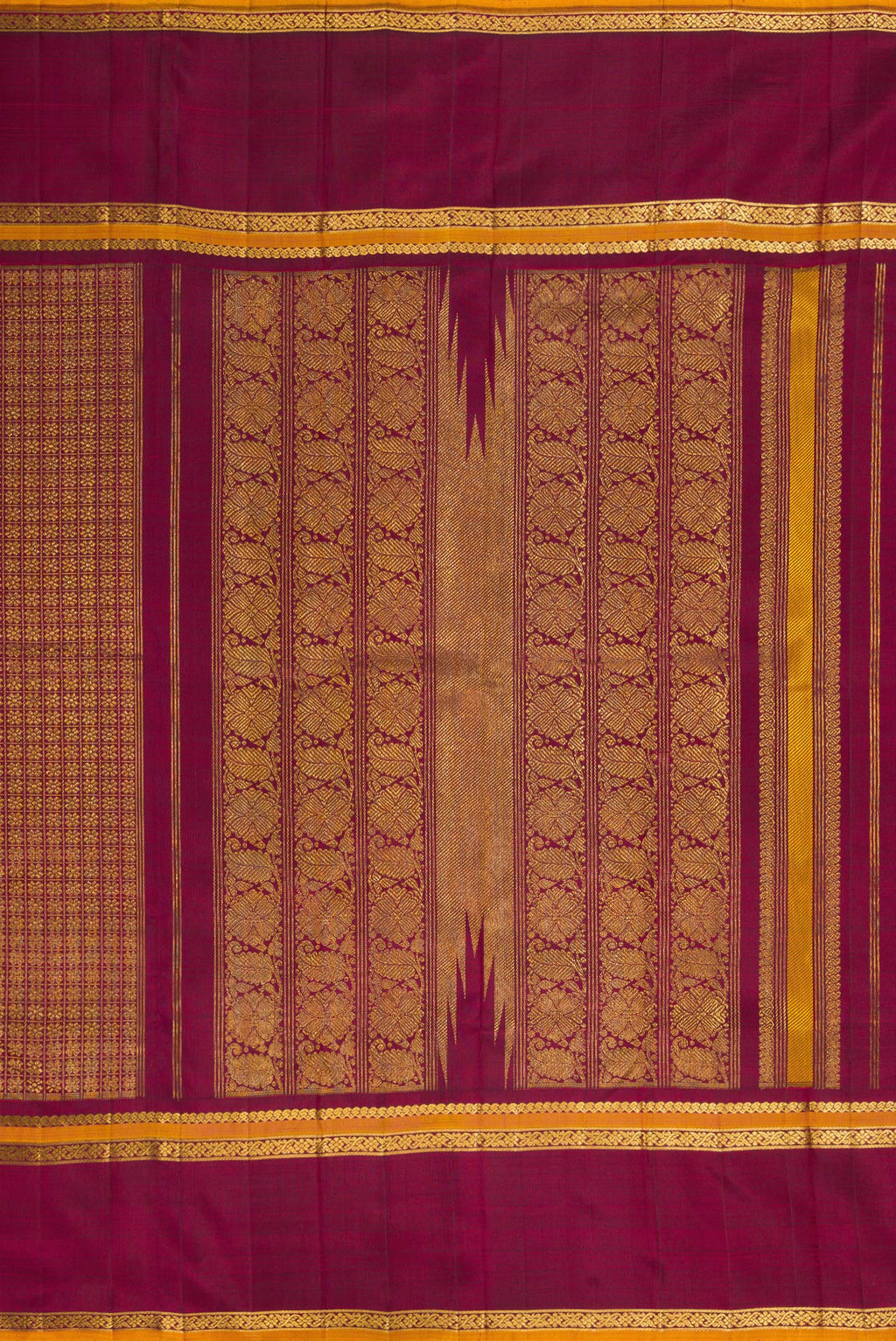 Close up image of the pallu of Burgundy Dual Tone Kanchipuram Silk Saree with Zari Brocade on the body and Zari Border. 