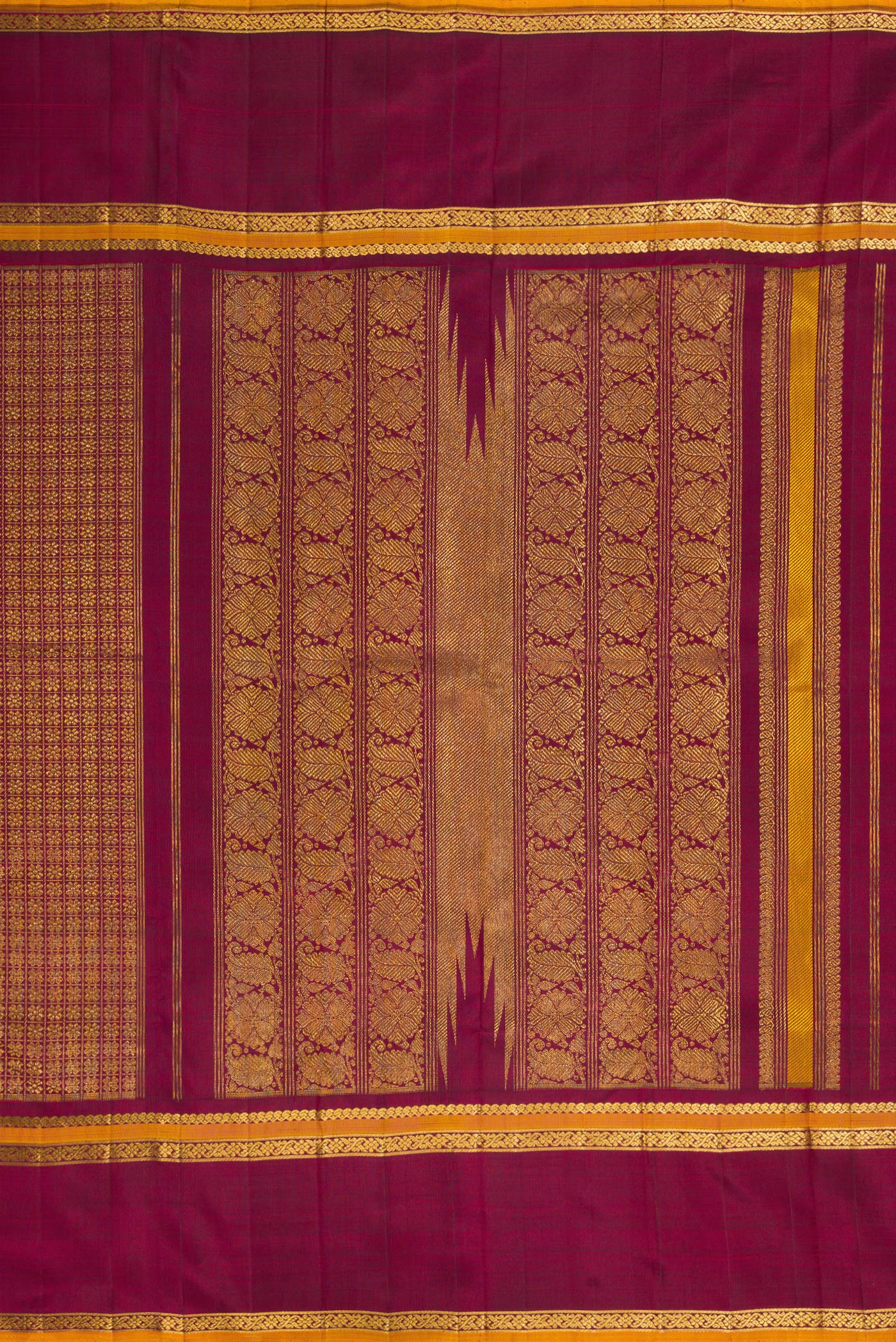 Close up image of the pallu of Burgundy Dual Tone Kanchipuram Silk Saree with Zari Brocade on the body and Zari Border. 