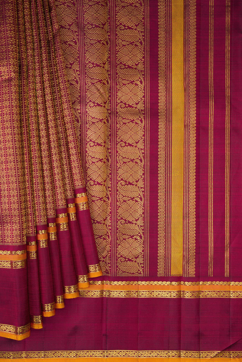 Pleats and pallu of Burgundy Dual Tone Kanchipuram Silk Saree with Zari Brocade on the body and Zari Border. 