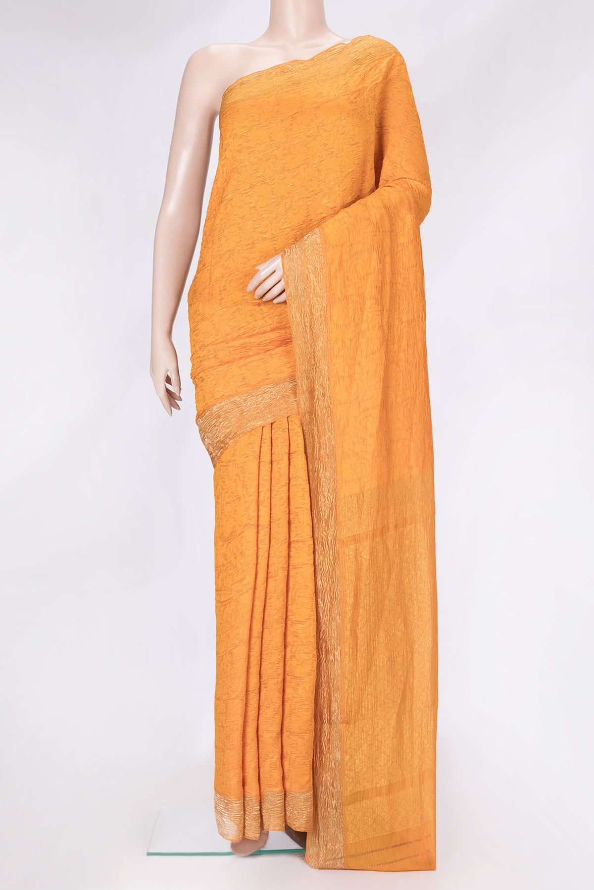 Orange Dual Tone Tussar Silk Saree with Jacquard design on the body and Zari Border.  displayed on a mannequin