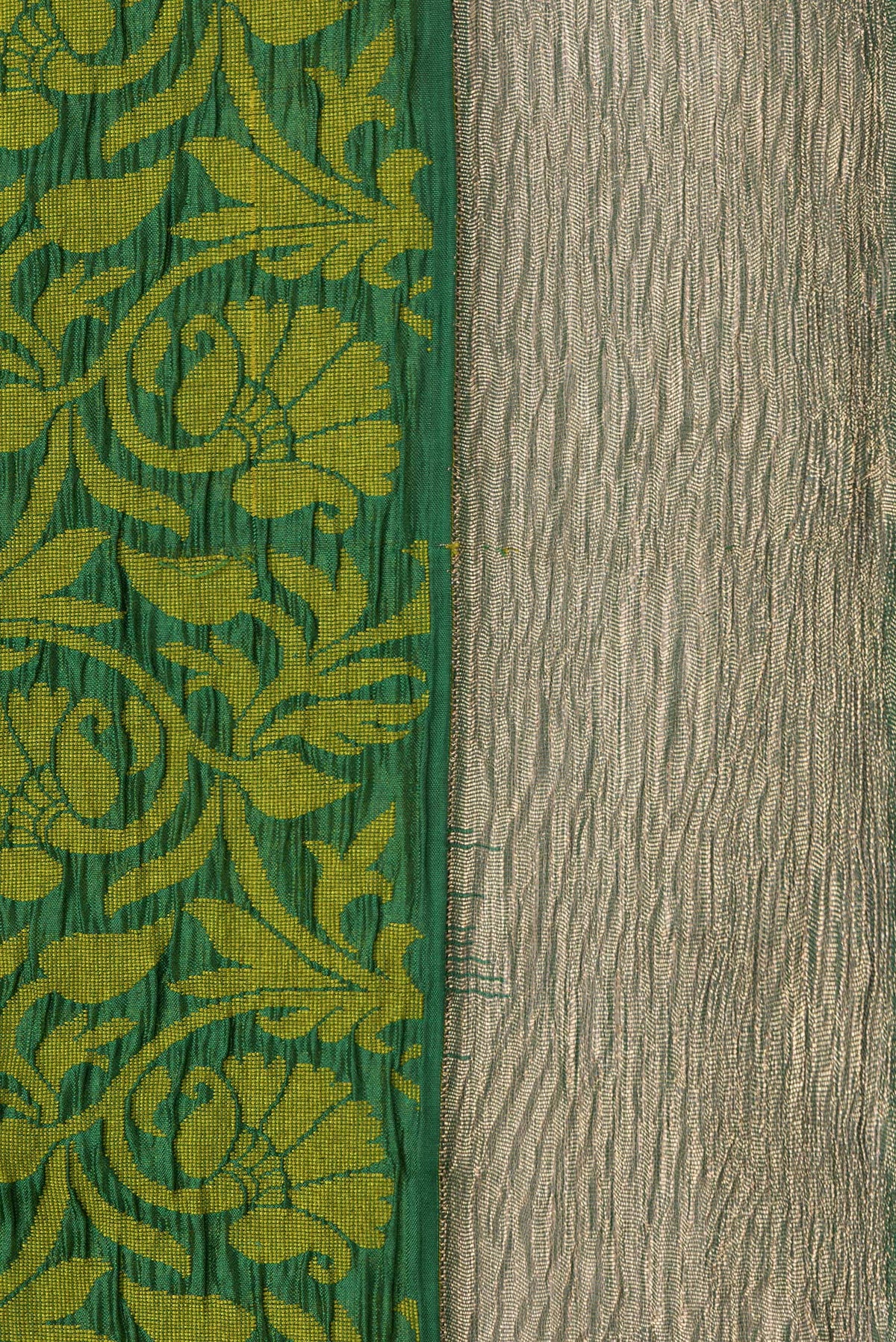 Border image of Bottle Green Dual Tone Tussar Silk Saree with Jacquard design on the body and Zari Border. 