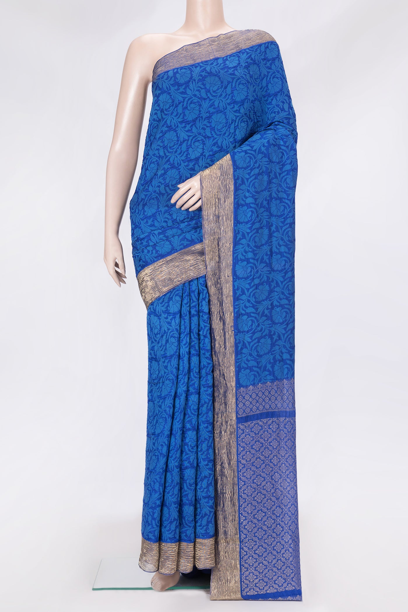 Royal Blue Dual Tone Tussar Silk Saree with Jacquard design on the body and Zari Border.  displayed on a mannequin