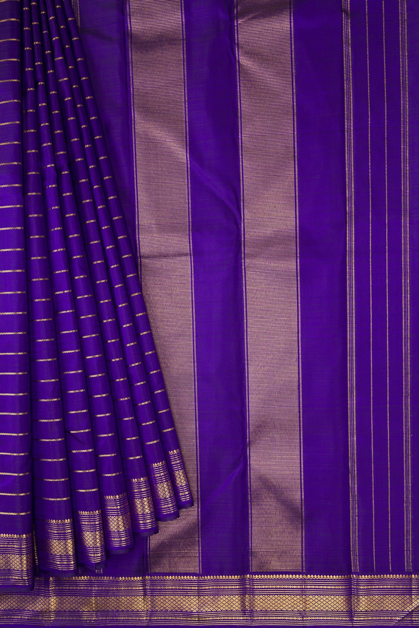 Pleats and pallu of Royal Blue Dual Tone Kanjivaram Silk Saree with Stripes on the body and Zari Border. 