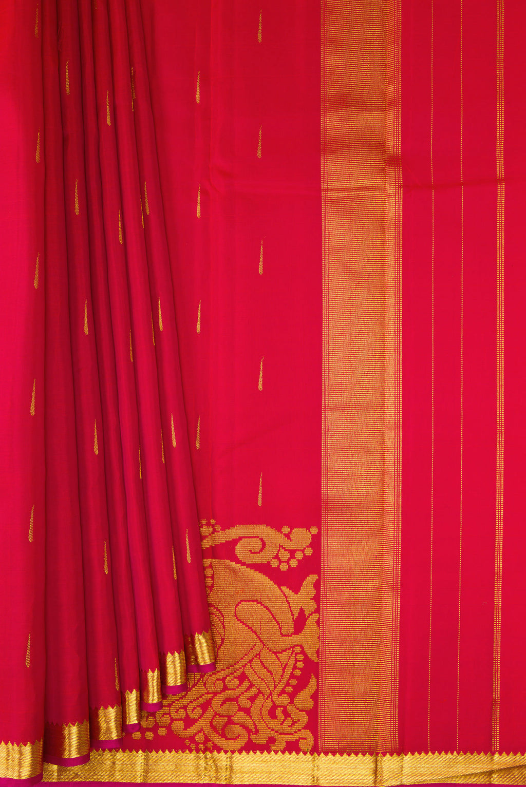 Pleats and pallu of Red Kanjivaram Silk Saree with Zari Butta on the body and Zari Border. 
