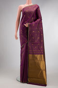 Pure Silk Pure Zari Burgundy Dual Tone Kanjivaram Saree with Stripes on the body and Zari Border.  displayed on a mannequin