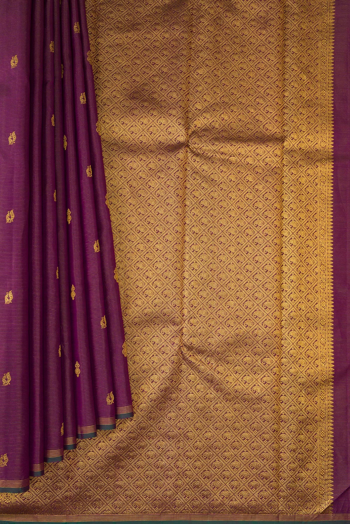 Pleats and pallu of Pure Silk Pure Zari Burgundy Dual Tone Kanjivaram Saree with Stripes on the body and Zari Border. 