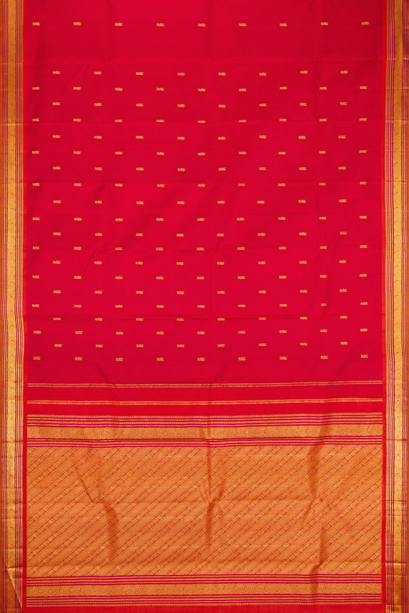 Flat view of Red Kanjivaram Silk Saree with Zari Butta on the body and Zari Border. 