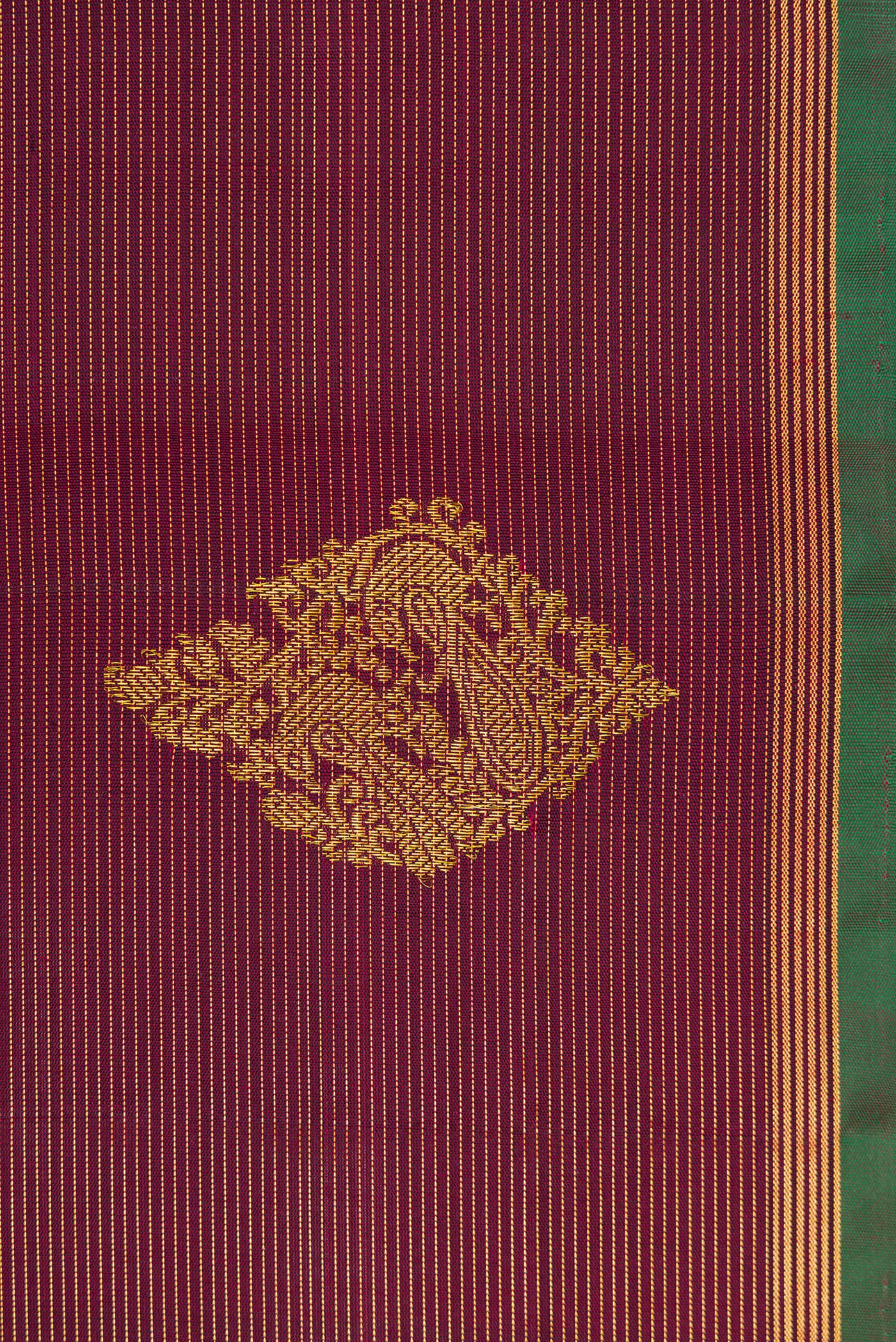 Border image of Burgundy Dual Tone Kanjivaram Silk Saree with Stripes on the body and Thin Zari Line. 
