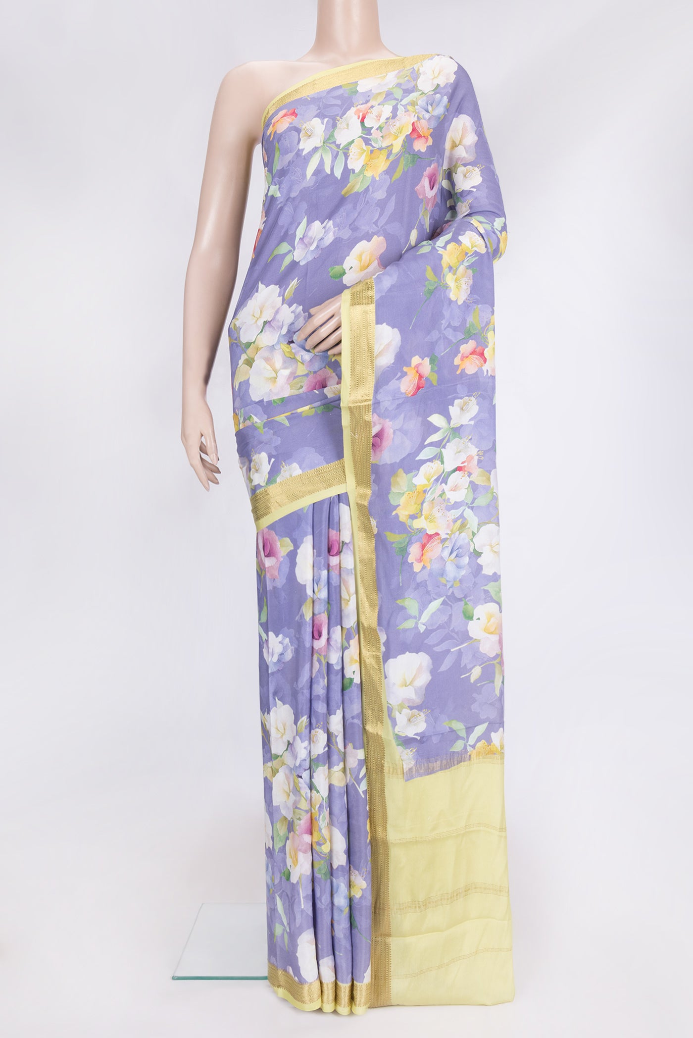 Lavender Dual Tone Mysore Crepe Saree with Printed design on the body and Zari Border.  displayed on a mannequin