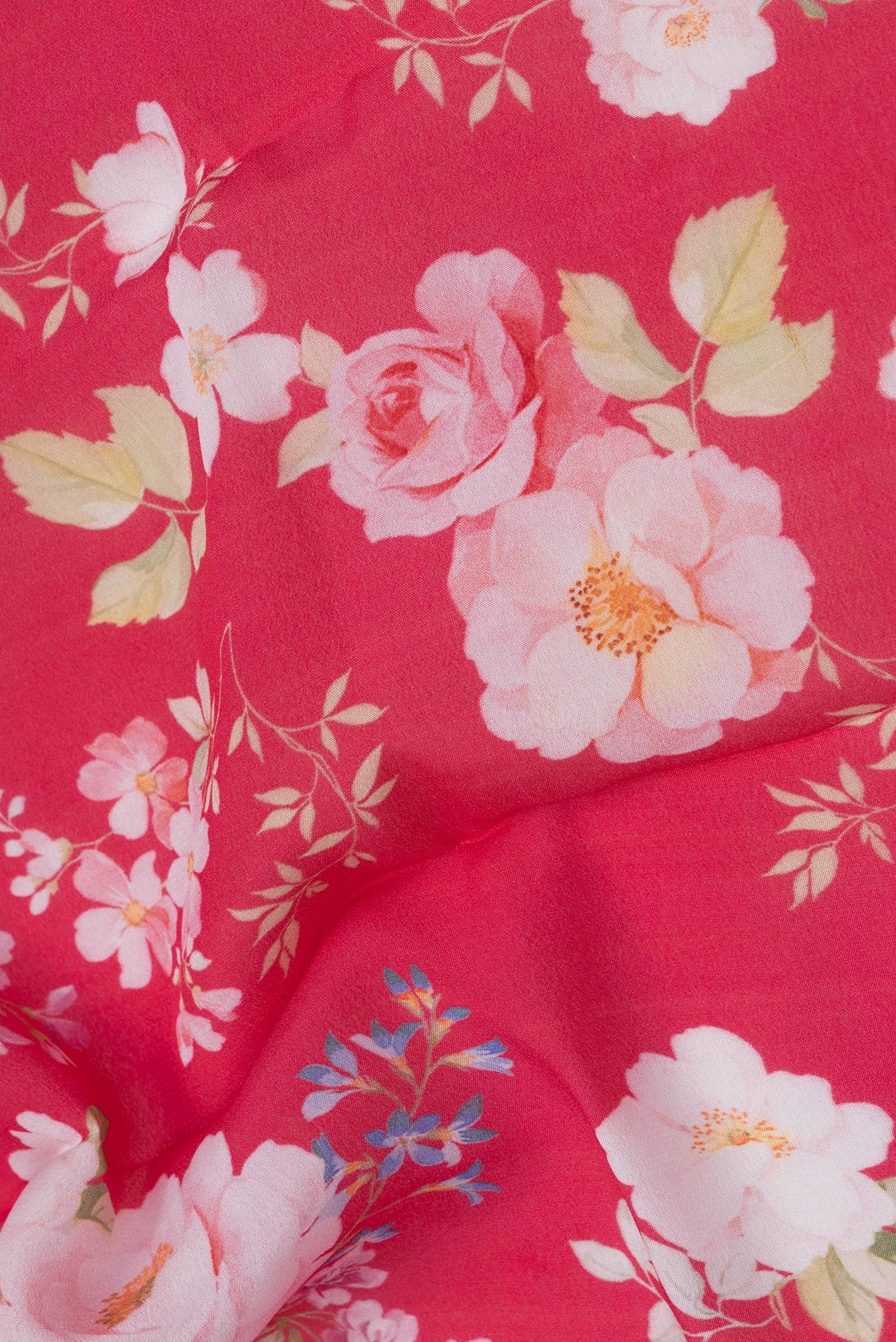 Close up of Pink Mysore Silk Saree with Printed design on the body and Zari Border.  displaying folds