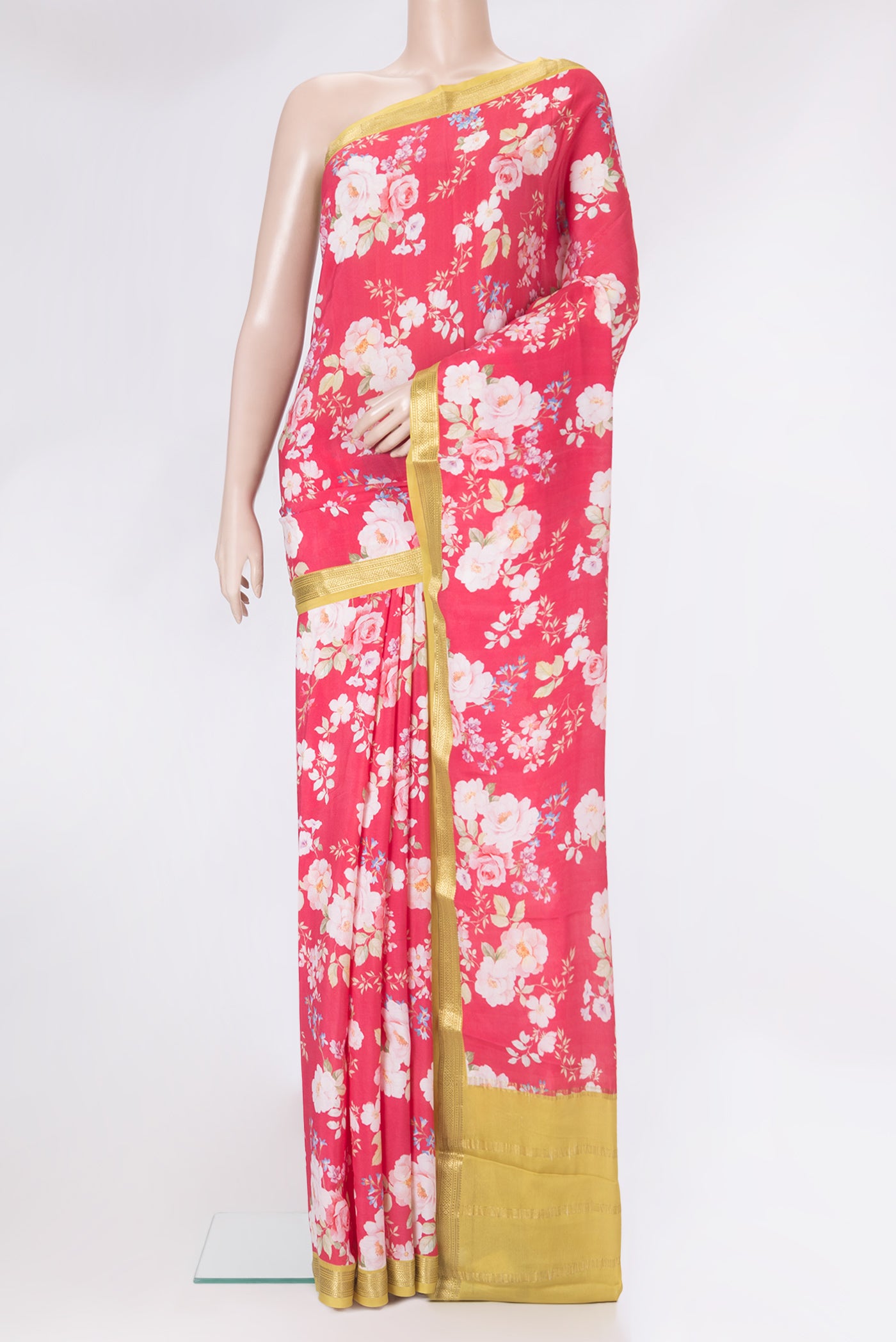 Pink Mysore Silk Saree with Printed design on the body and Zari Border.  displayed on a mannequin