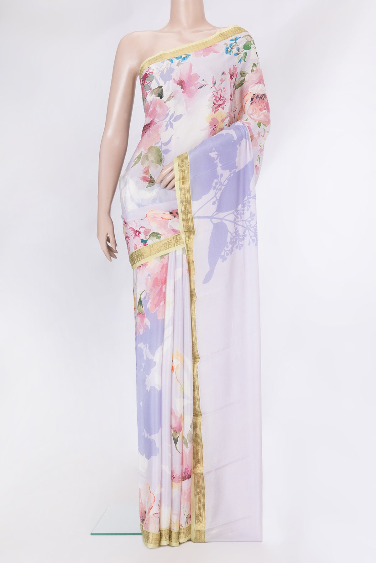 Lavender Dual Tone Mysore Crepe Saree with Printed design on the body and Zari Border.  displayed on a mannequin