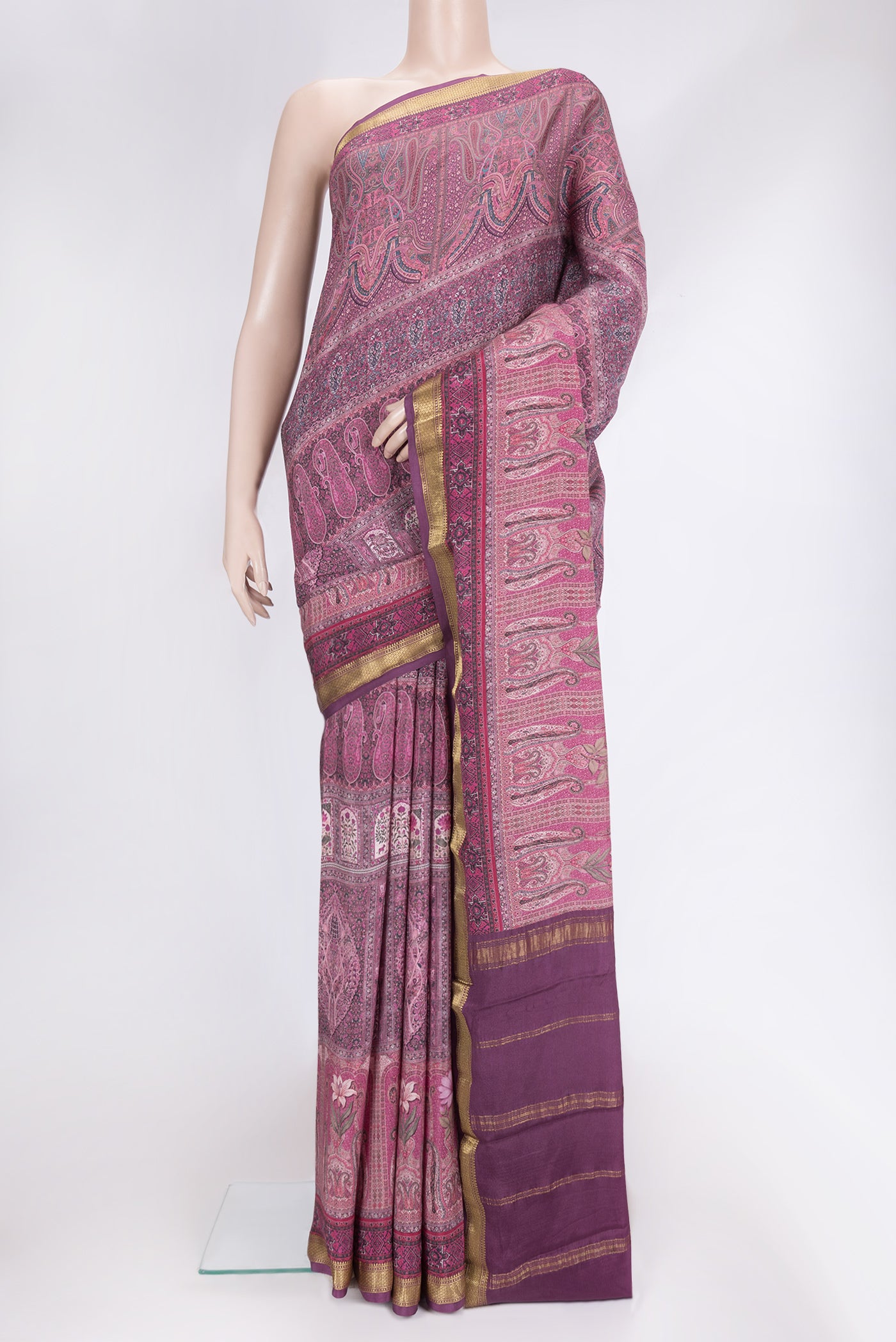 Magenta Dual Tone Mysore Crepe Saree with Printed design on the body and Zari Border.  displayed on a mannequin