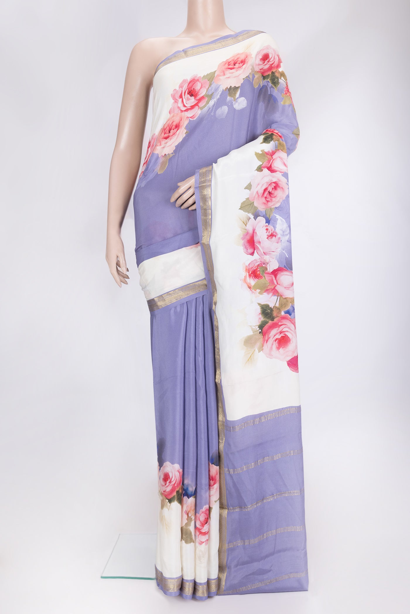 Lavender Dual Tone Mysore Crepe Saree with Printed design on the body and Zari Border.  displayed on a mannequin