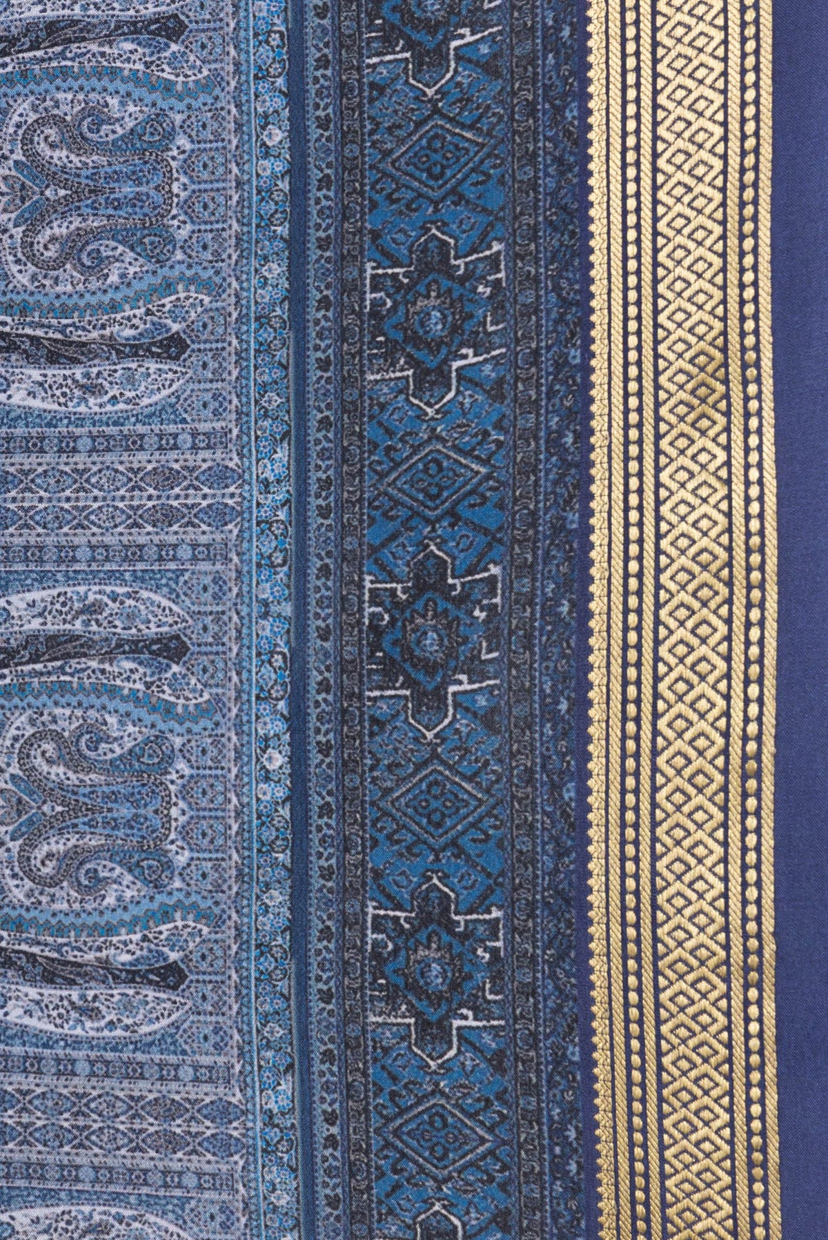 Border image of Navy Blue Dual Tone Mysore Crepe Saree with Printed design on the body and Zari Border. 