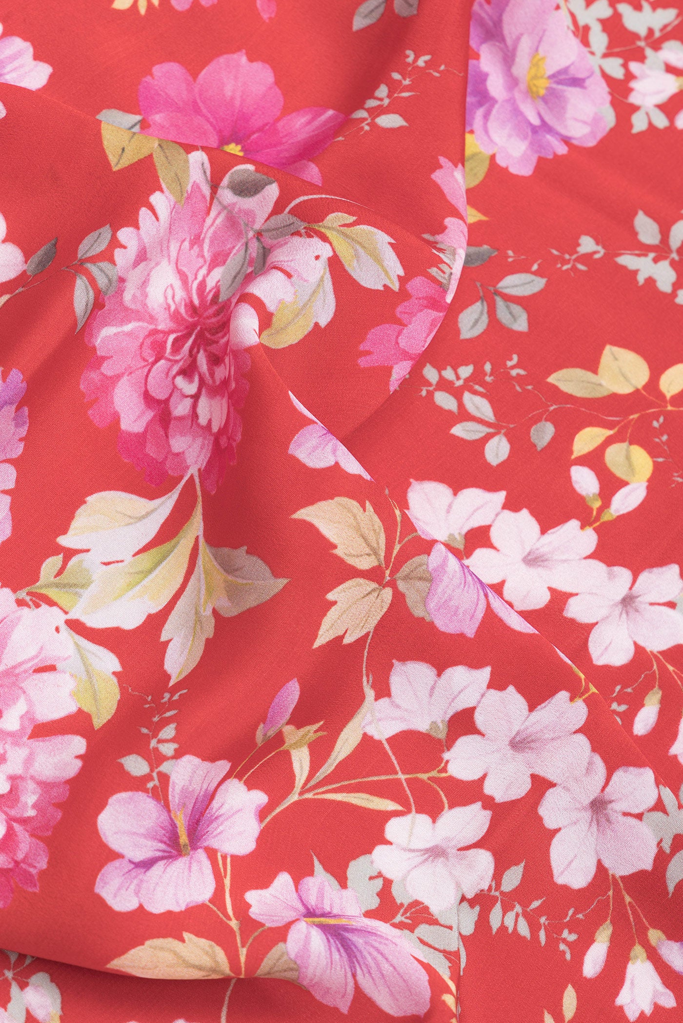 Close up of Red Dual Tone Mysore Crepe Saree with Printed design on the body and Zari Border.  displaying folds