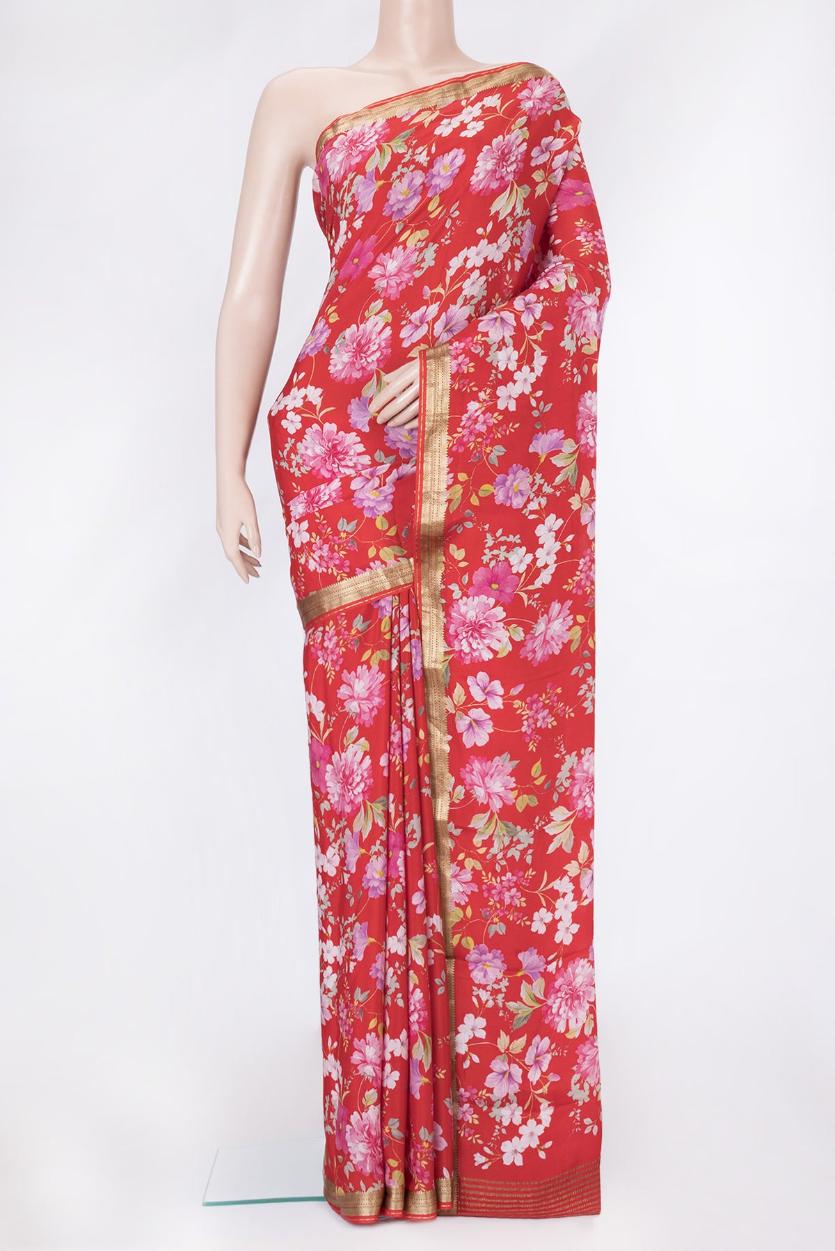 Red Dual Tone Mysore Crepe Saree with Printed design on the body and Zari Border.  displayed on a mannequin