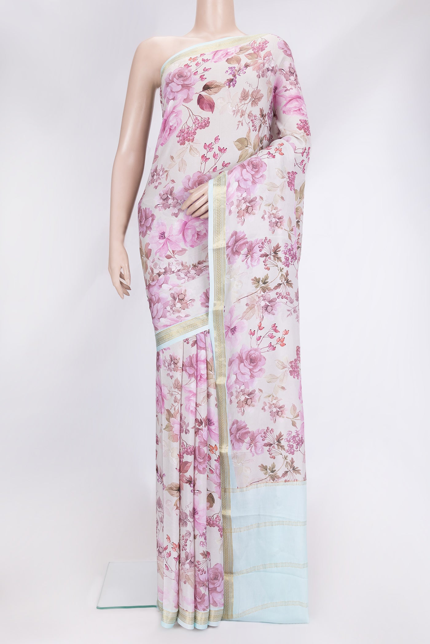 Beige Dual Tone Mysore Crepe Saree with Printed design on the body and Zari Border.  displayed on a mannequin