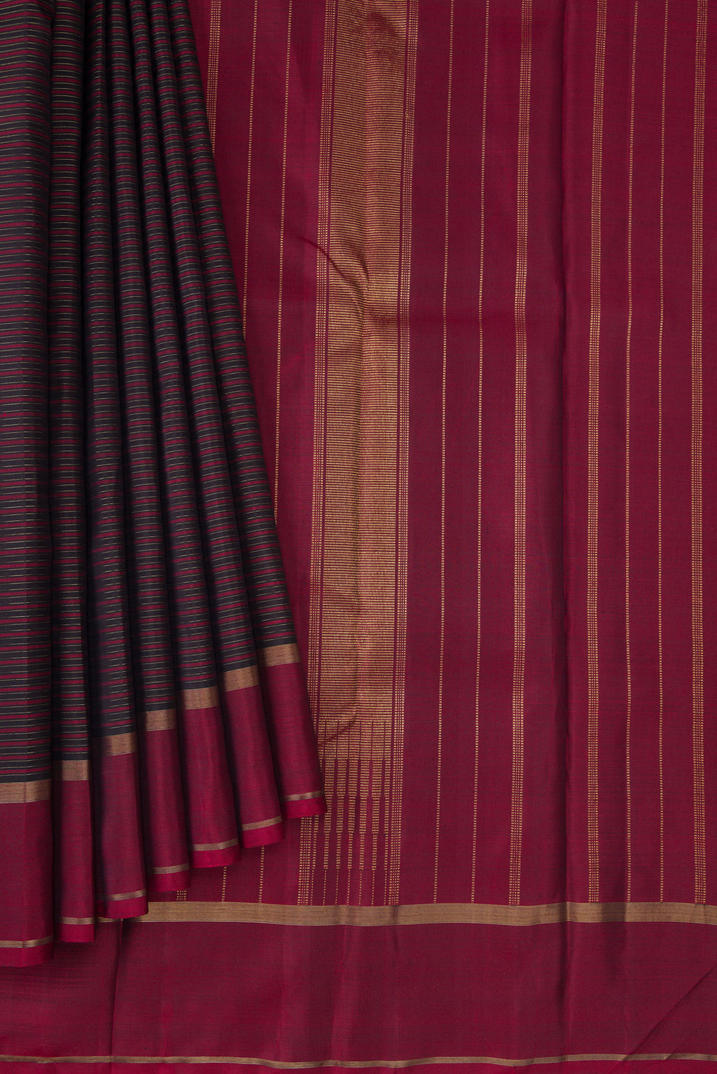 Pleats and pallu of Pure Silk Pure Zari Burgundy Dual Tone Kanchipuram Saree with Stripes on the body and Zari Border. 