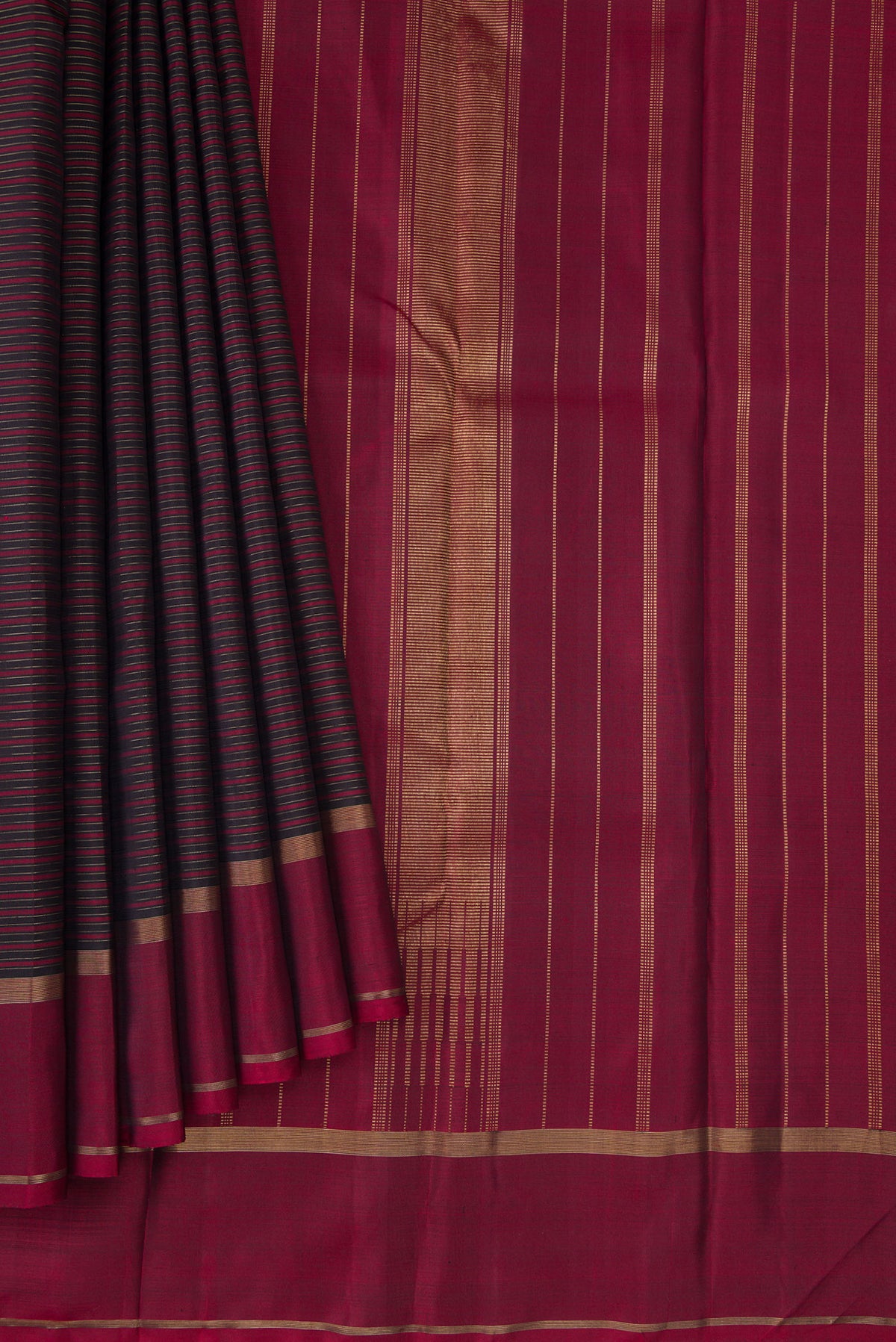 Pleats and pallu of Pure Silk Pure Zari Burgundy Dual Tone Kanchipuram Saree with Stripes on the body and Zari Border. 