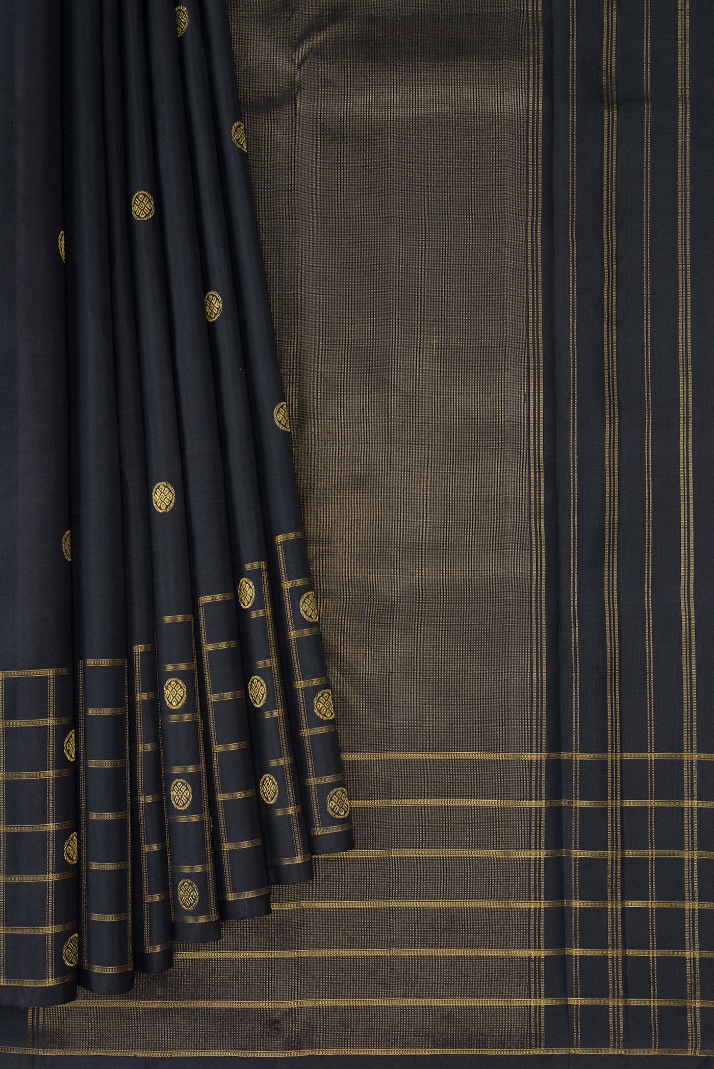 Pleats and pallu of Black Kanchipuram Silk Saree with Zari Butta on the body and Checks Border. 