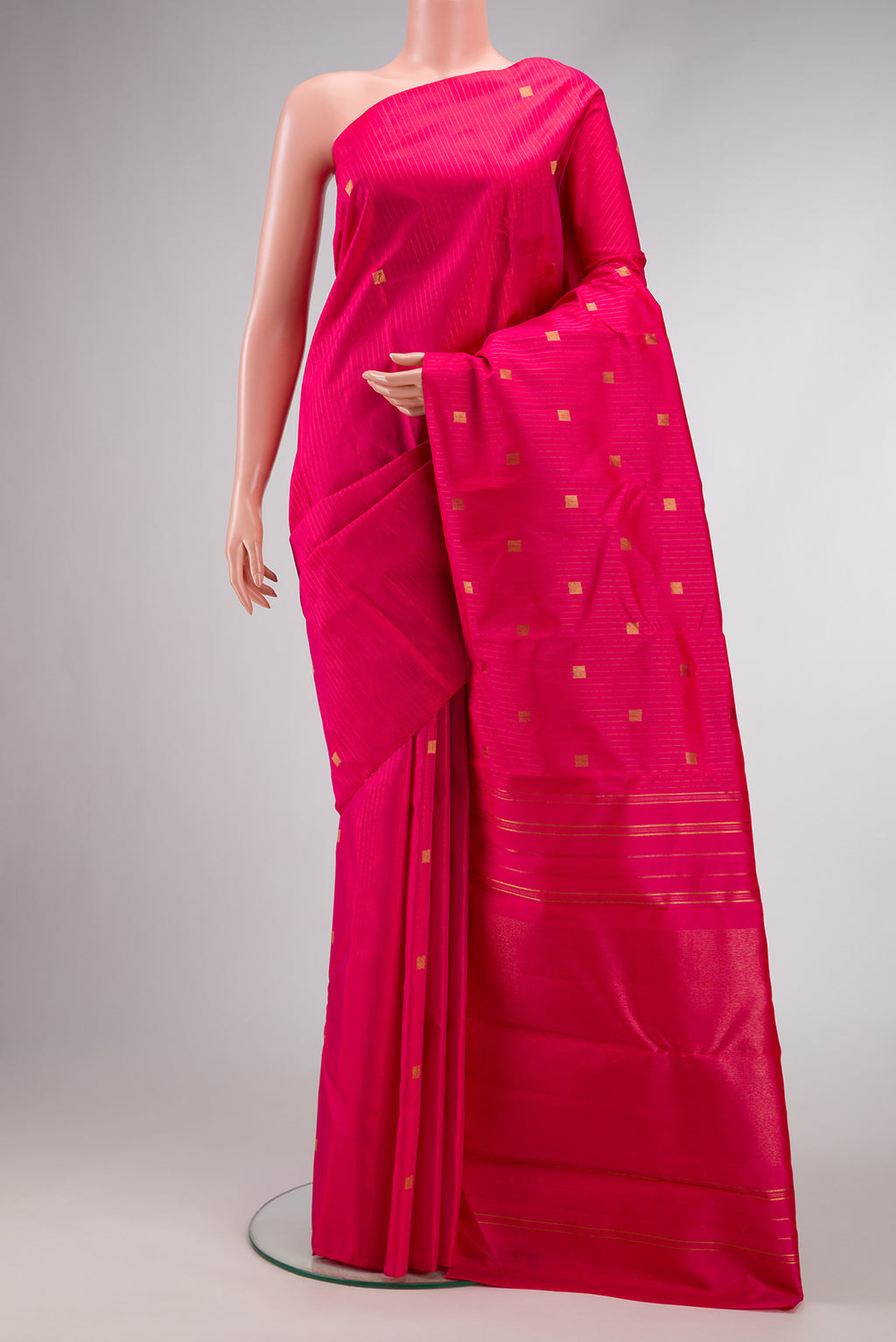 Pure Silk Pure Zari Pink Dual Tone Kanchipuram Saree with Zari Butta on the body and Without Border.  displayed on a mannequin