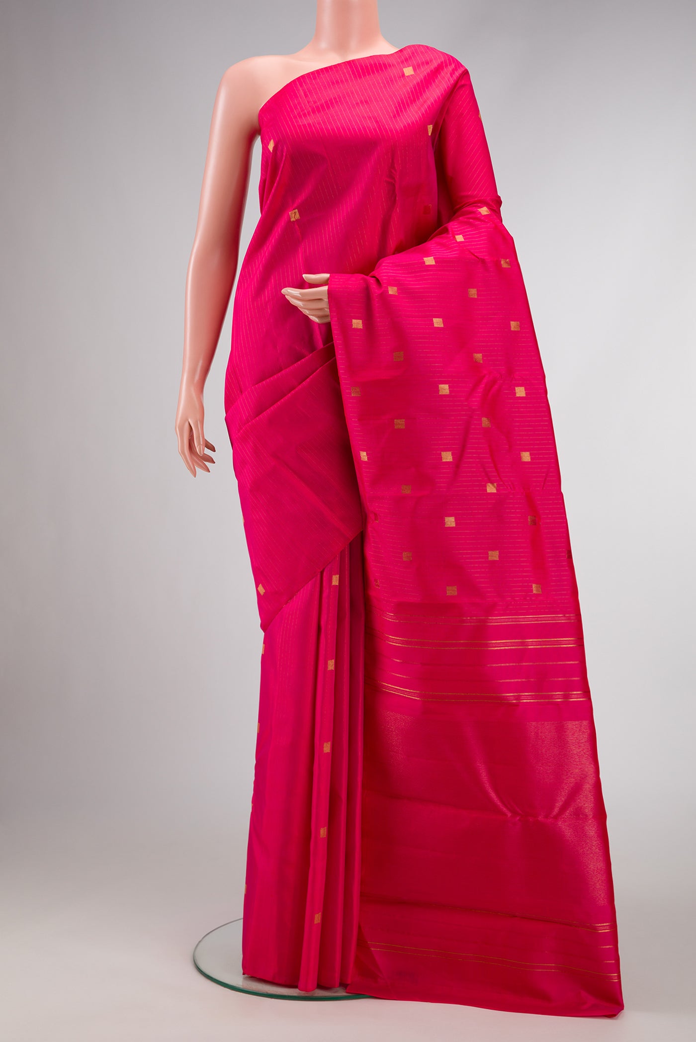Pure Silk Pure Zari Pink Dual Tone Kanchipuram Saree with Zari Butta on the body and Without Border.  displayed on a mannequin