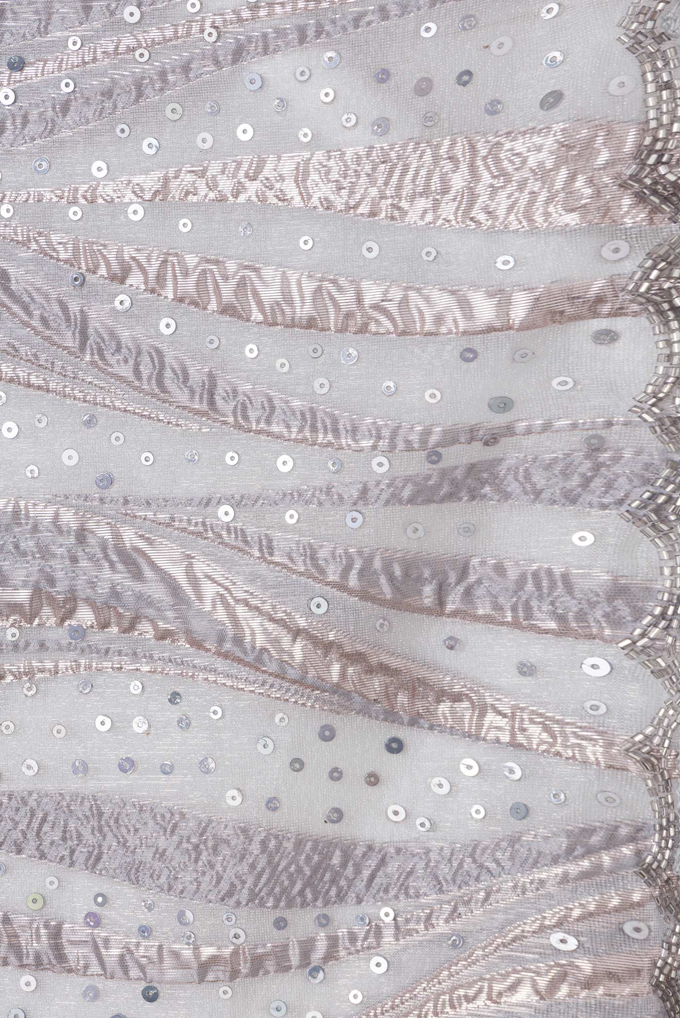 Border image of Grey Dual Tone Organza Silk Saree with Embroidery on the body and Embroidery Border. 