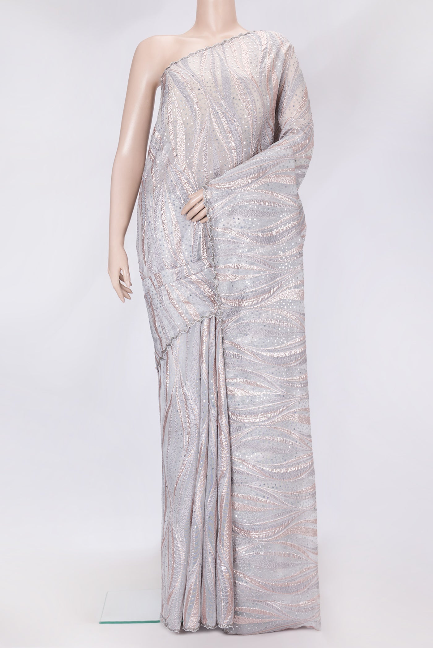 Grey Dual Tone Organza Silk Saree with Embroidery on the body and Embroidery Border.  displayed on a mannequin