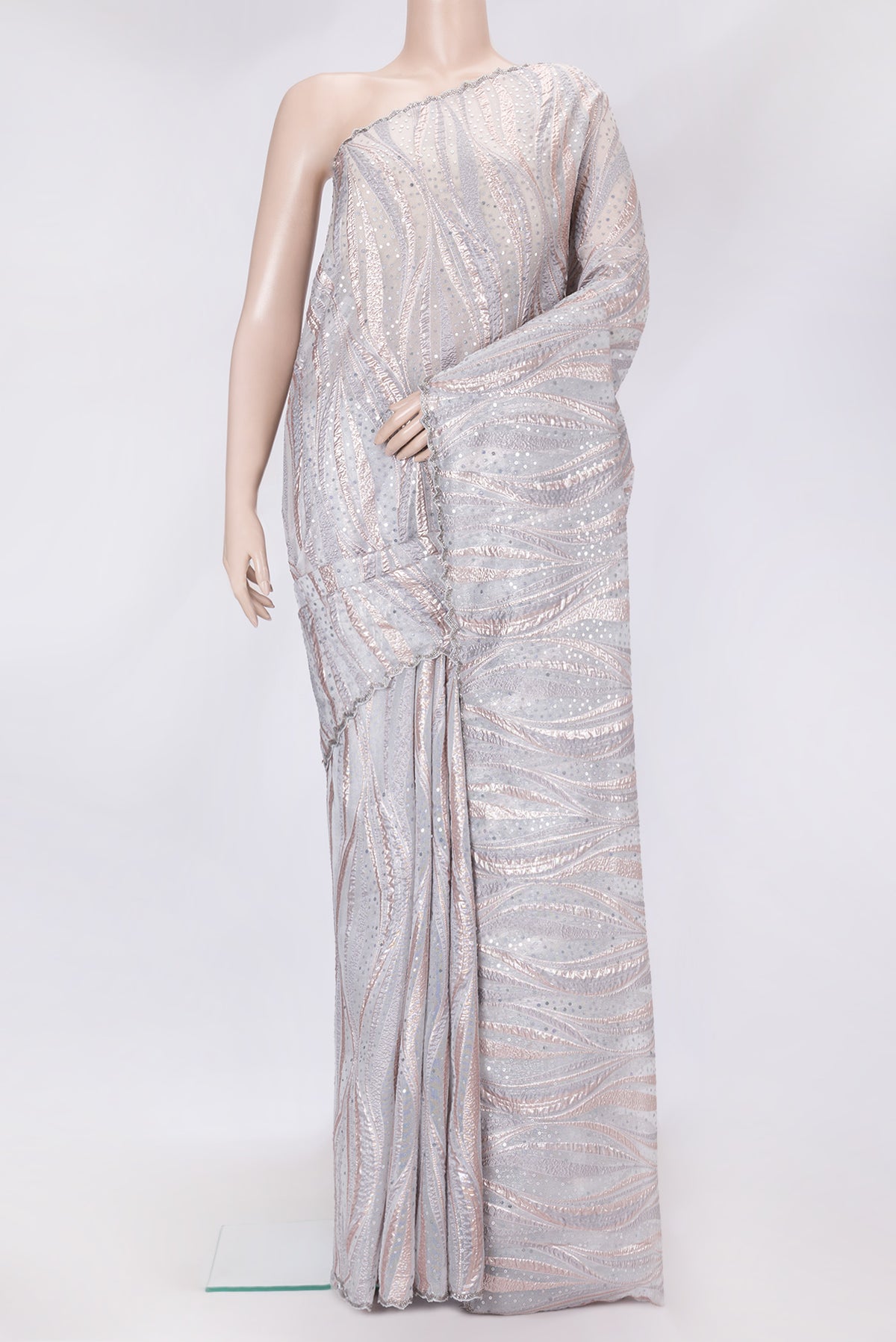 Grey Dual Tone Organza Silk Saree with Embroidery on the body and Embroidery Border.  displayed on a mannequin