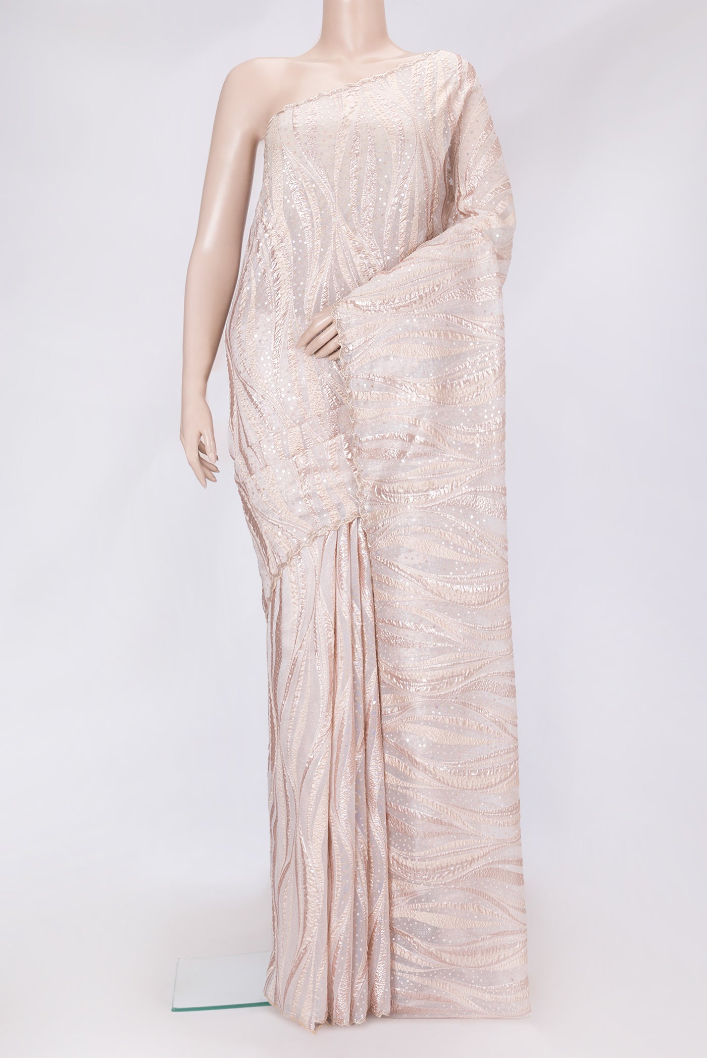 Gold Dual Tone Organza Silk Saree with Embroidery on the body and Embroidery Border.  displayed on a mannequin