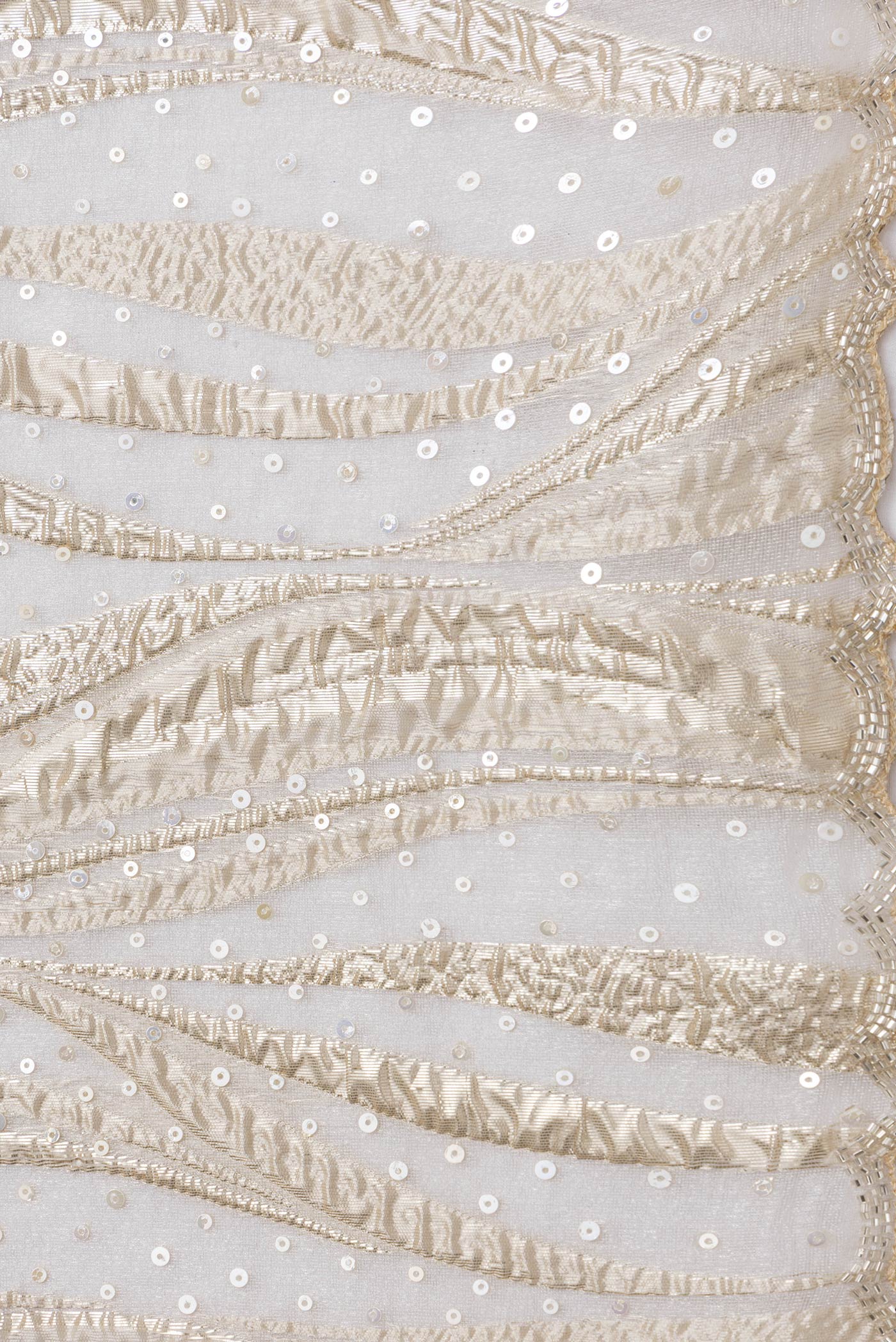 Border image of Gold Dual Tone Organza Silk Saree with Embroidery on the body and Embroidery Border. 