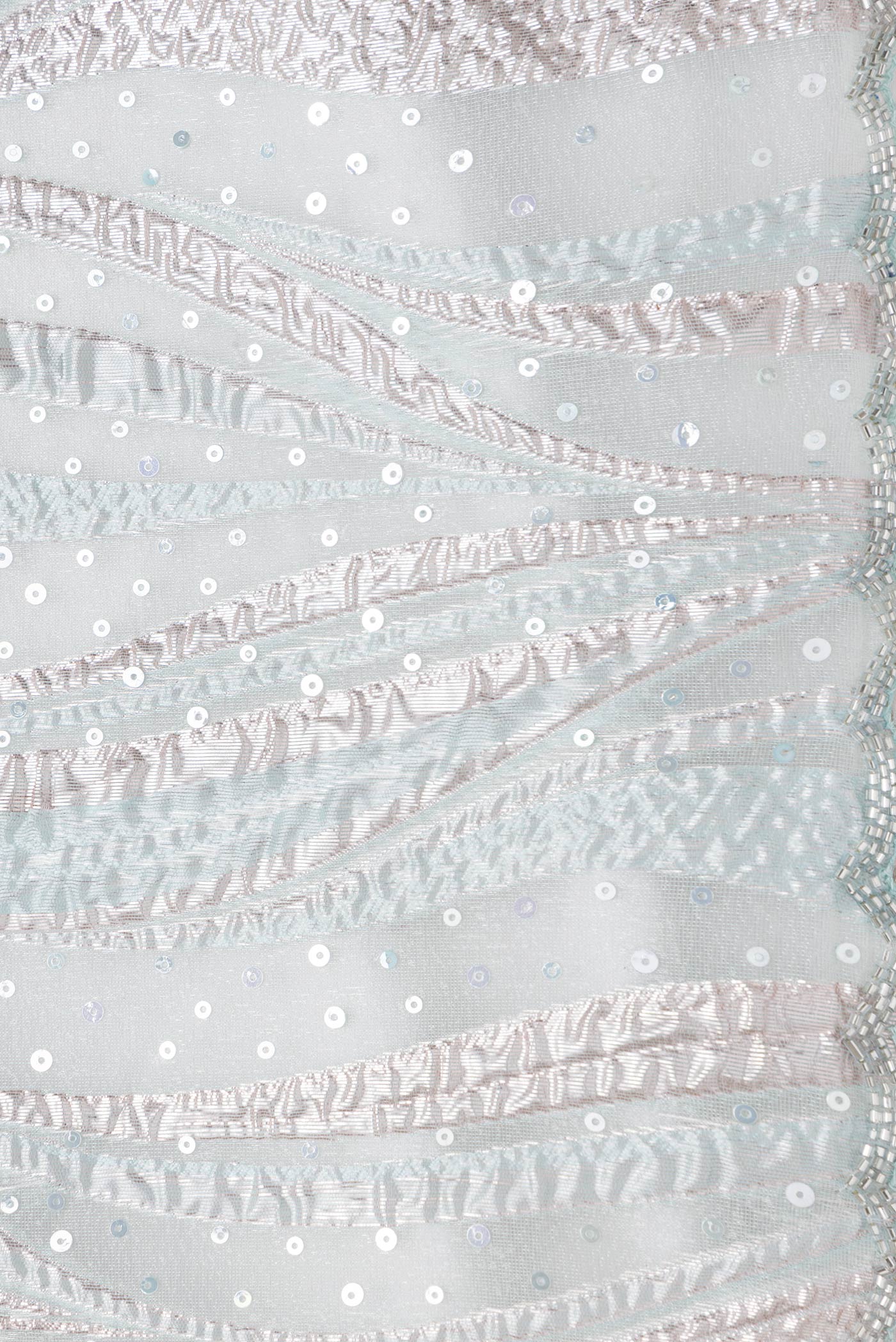 Border image of Sea Green Dual Tone Organza Silk Saree with Embroidery on the body and Embroidery Border. 