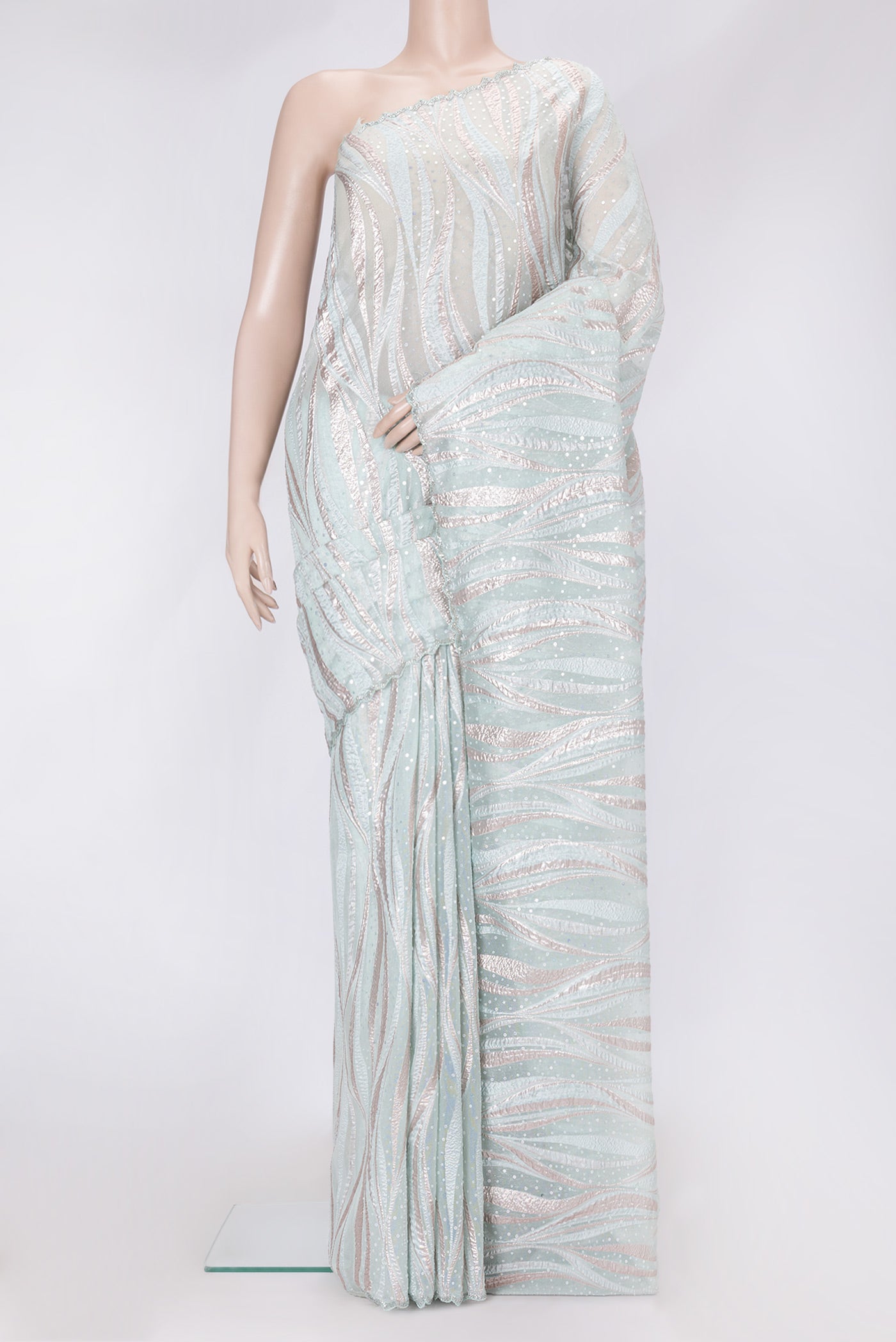 Sea Green Dual Tone Organza Silk Saree with Embroidery on the body and Embroidery Border.  displayed on a mannequin