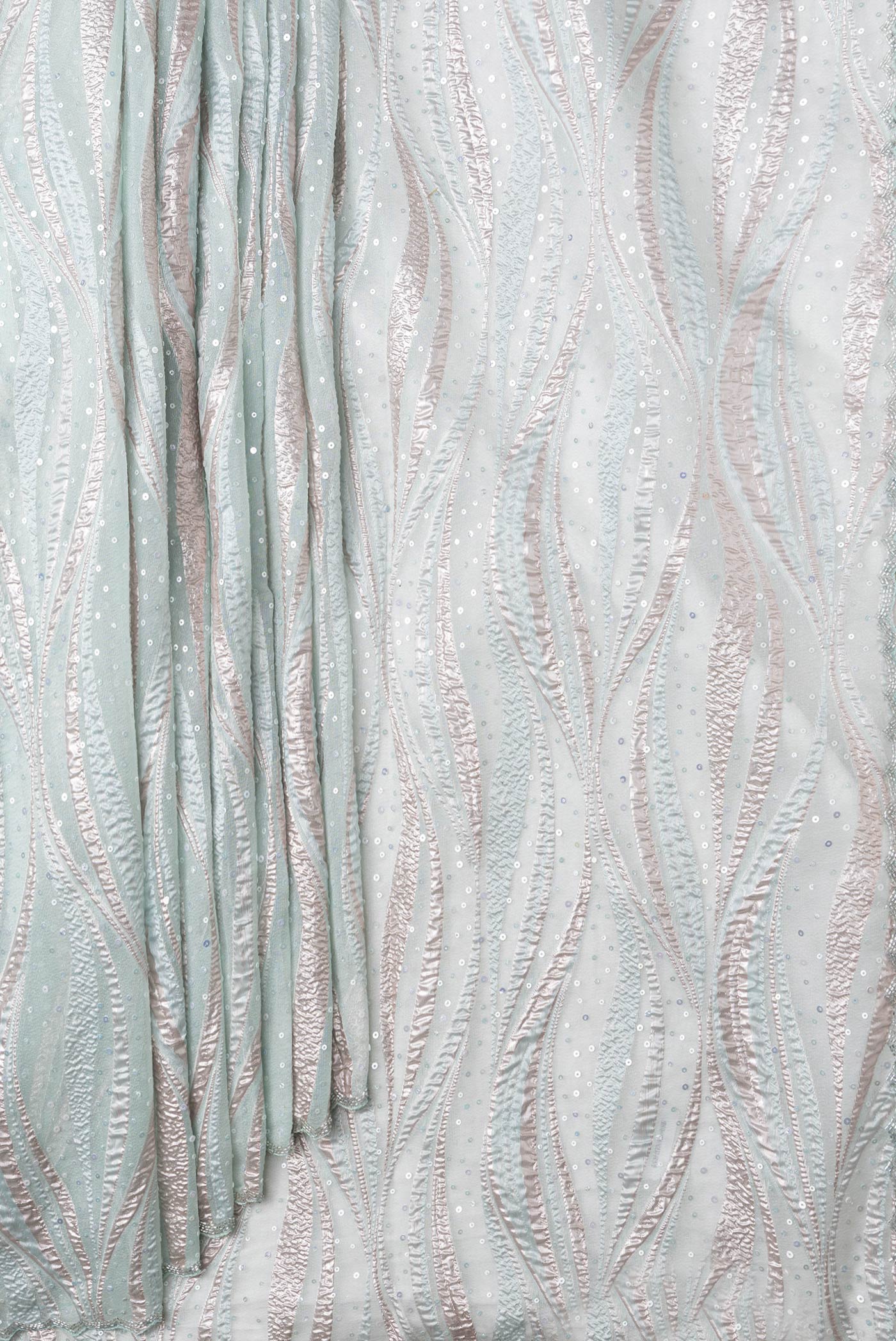 Pleats and pallu of Sea Green Dual Tone Organza Silk Saree with Embroidery on the body and Embroidery Border. 
