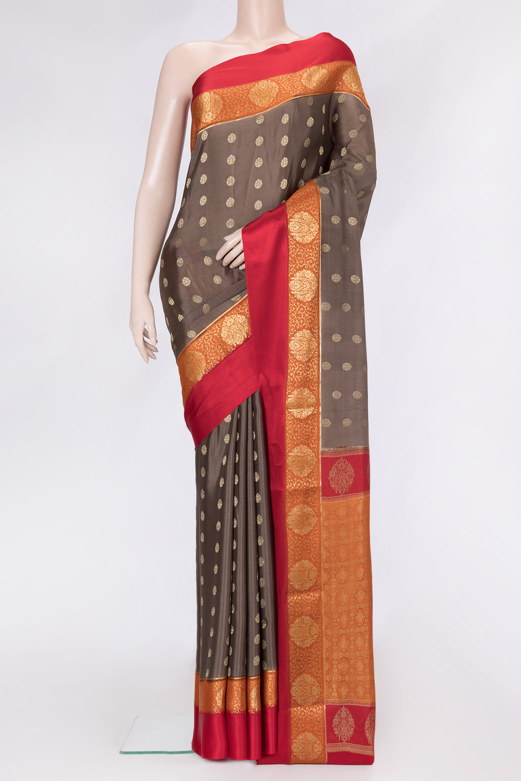 Brown Dual Tone Mysore Silk Saree with Zari Butta on the body and Fancy Border.  displayed on a mannequin