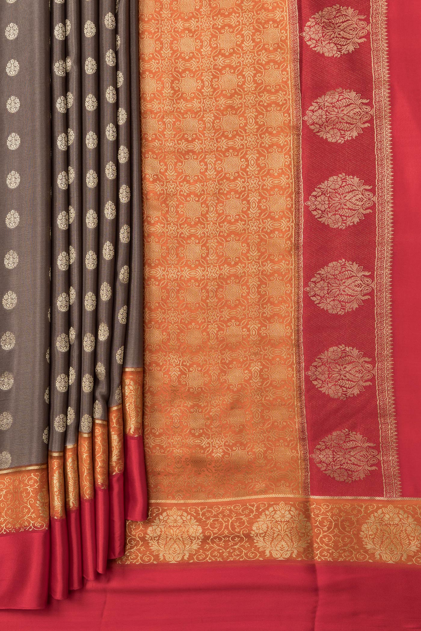 Pleats and pallu of Brown Dual Tone Mysore Silk Saree with Zari Butta on the body and Fancy Border. 