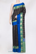 Black Mysore Crepe Saree with Zari Butta on the body and Fancy Border.  displayed on a mannequin