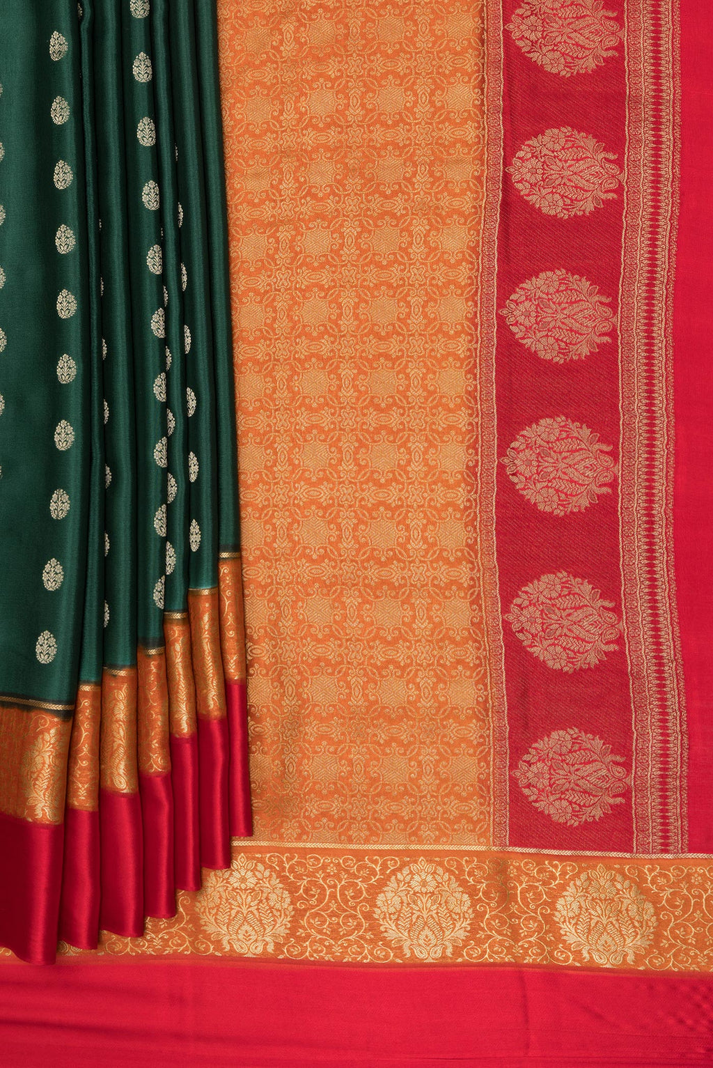 Pleats and pallu of Bottle Green Mysore Silk Saree with Zari Butta on the body and Zari Border. 
